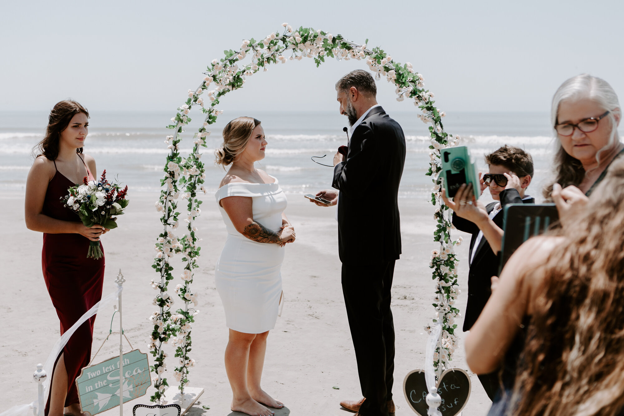 Ceremony vows exchange. Micro Wedding (Elopement) on the Beach