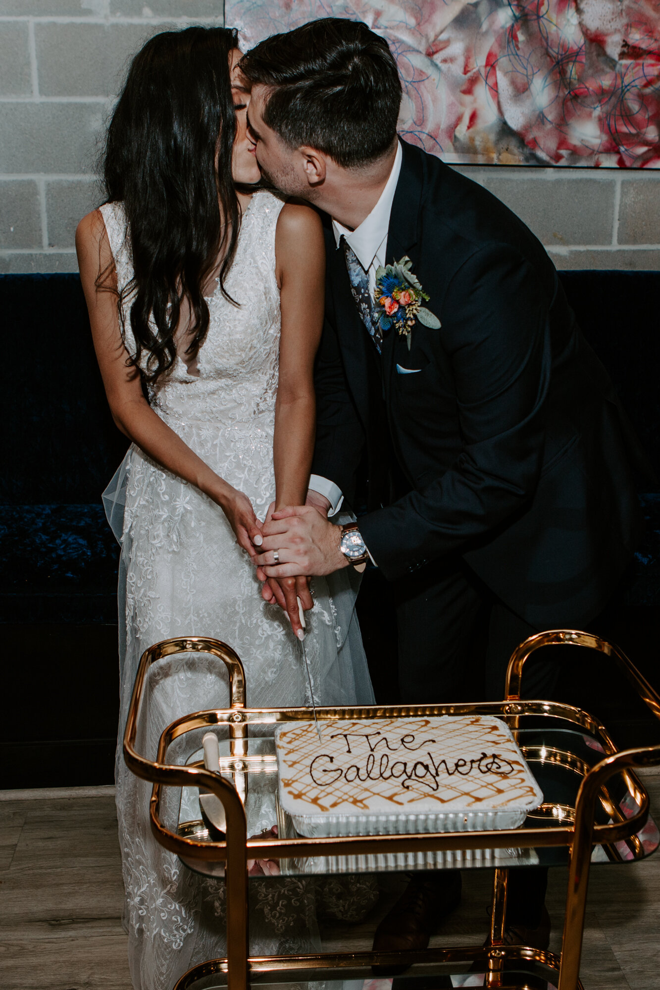 Bride and groom cake cutting. Wedding Reception at Texas Avenue BNB