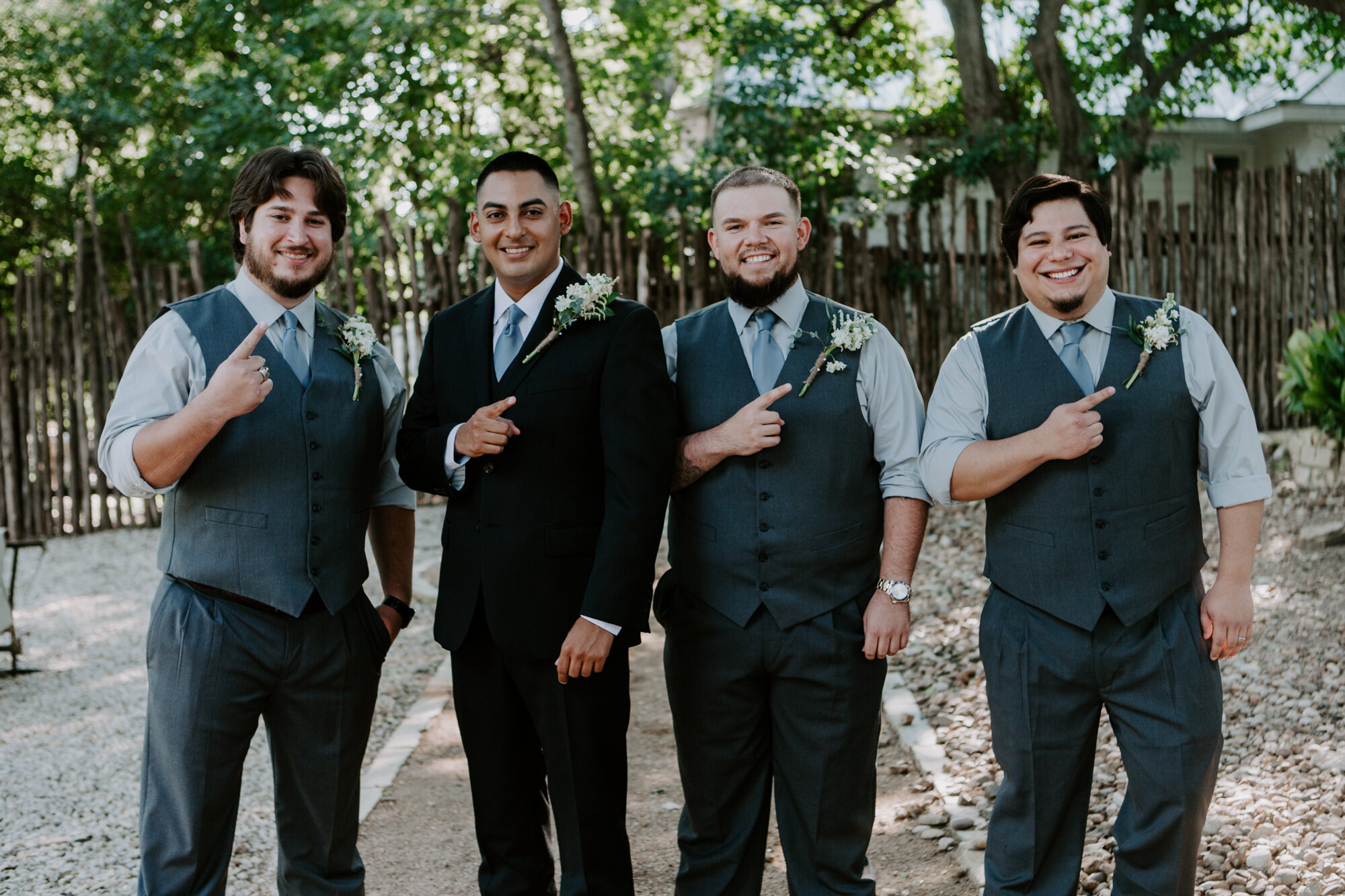 Groom and groomsmen portraits. Radiant Bohemian Hill Country Wedding at Gruene Estate in New Braunfels, TX