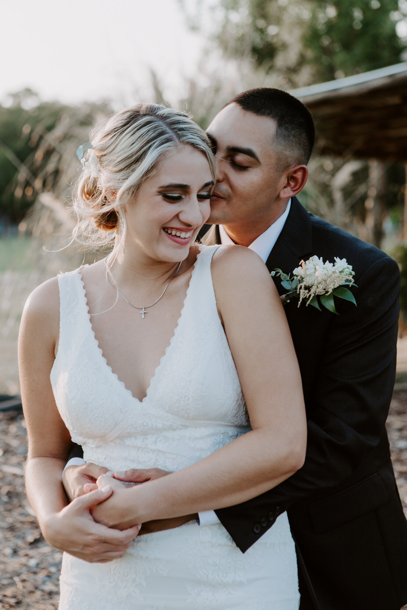 Bride and groom super romantic photo. Radiant Bohemian Hill Country Wedding at Gruene Estate in New Braunfels, TX