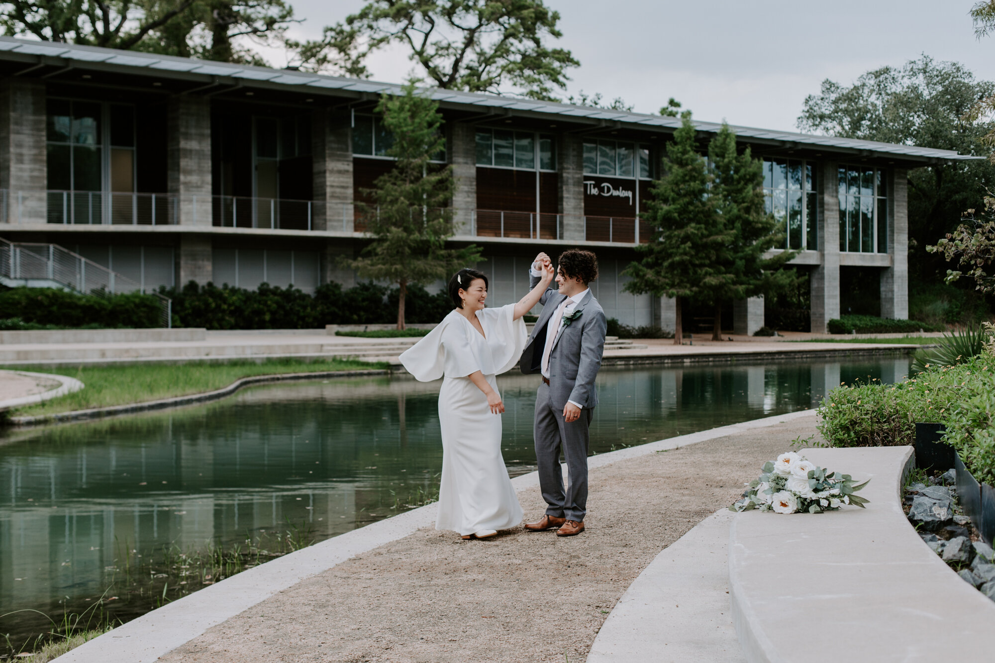 Dance and a twirl. Bride and Groom Wedding Photo Session at The Lost Lake Buffalo Bayou Park