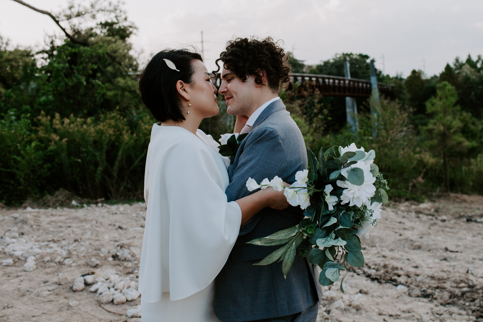 Sunset look. Bride and Groom Wedding Photo Session at The Lost Lake Buffalo Bayou Park