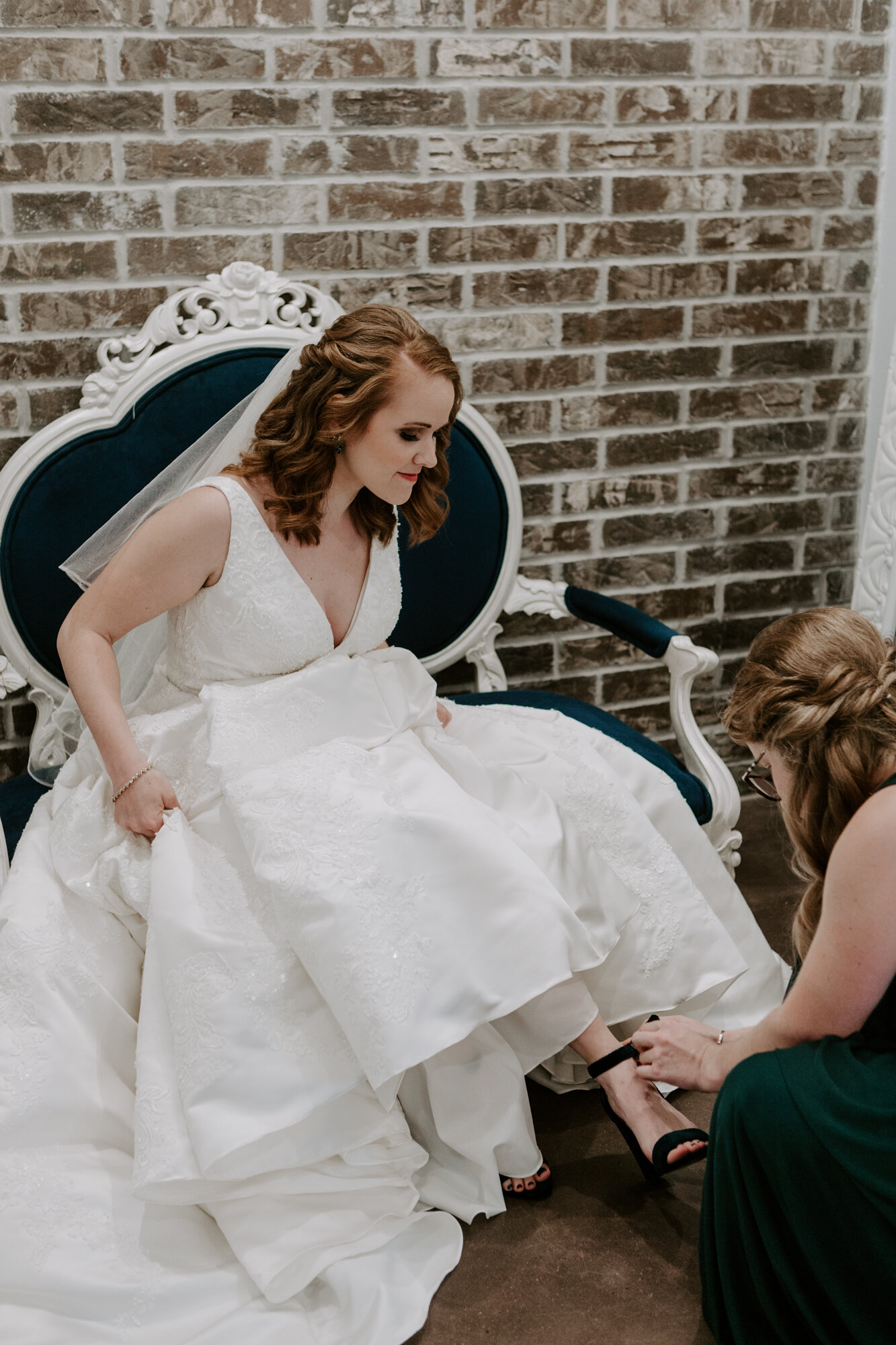 Bride getting ready Mesmerizing Wedding in Emerald Green at Venue 311 in Plantersville, TX 