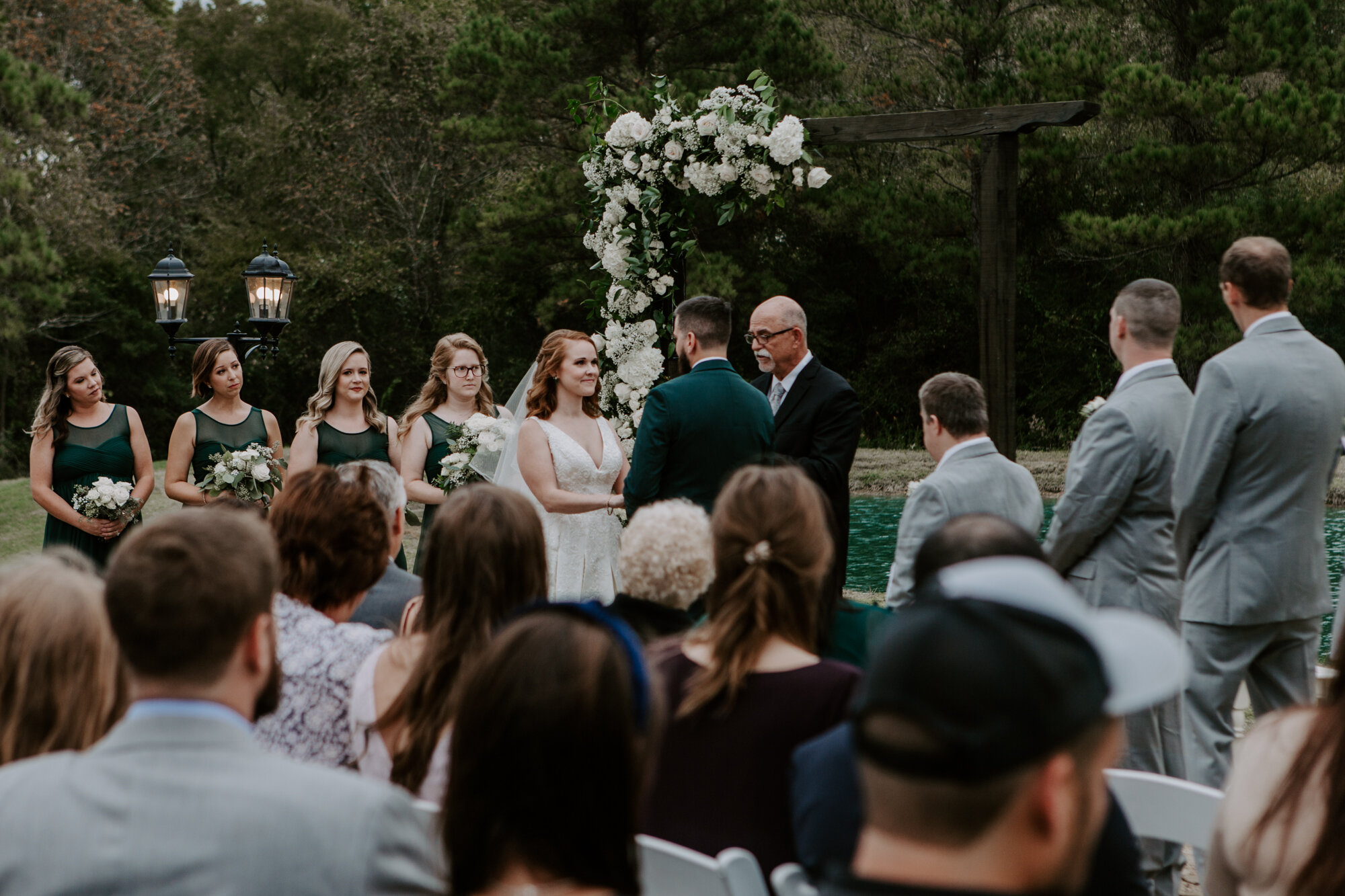 Focus on Bride. Mesmerizing Outdoor Wedding Ceremony in Emerald Green at Venue 311 in Plantersville, TX