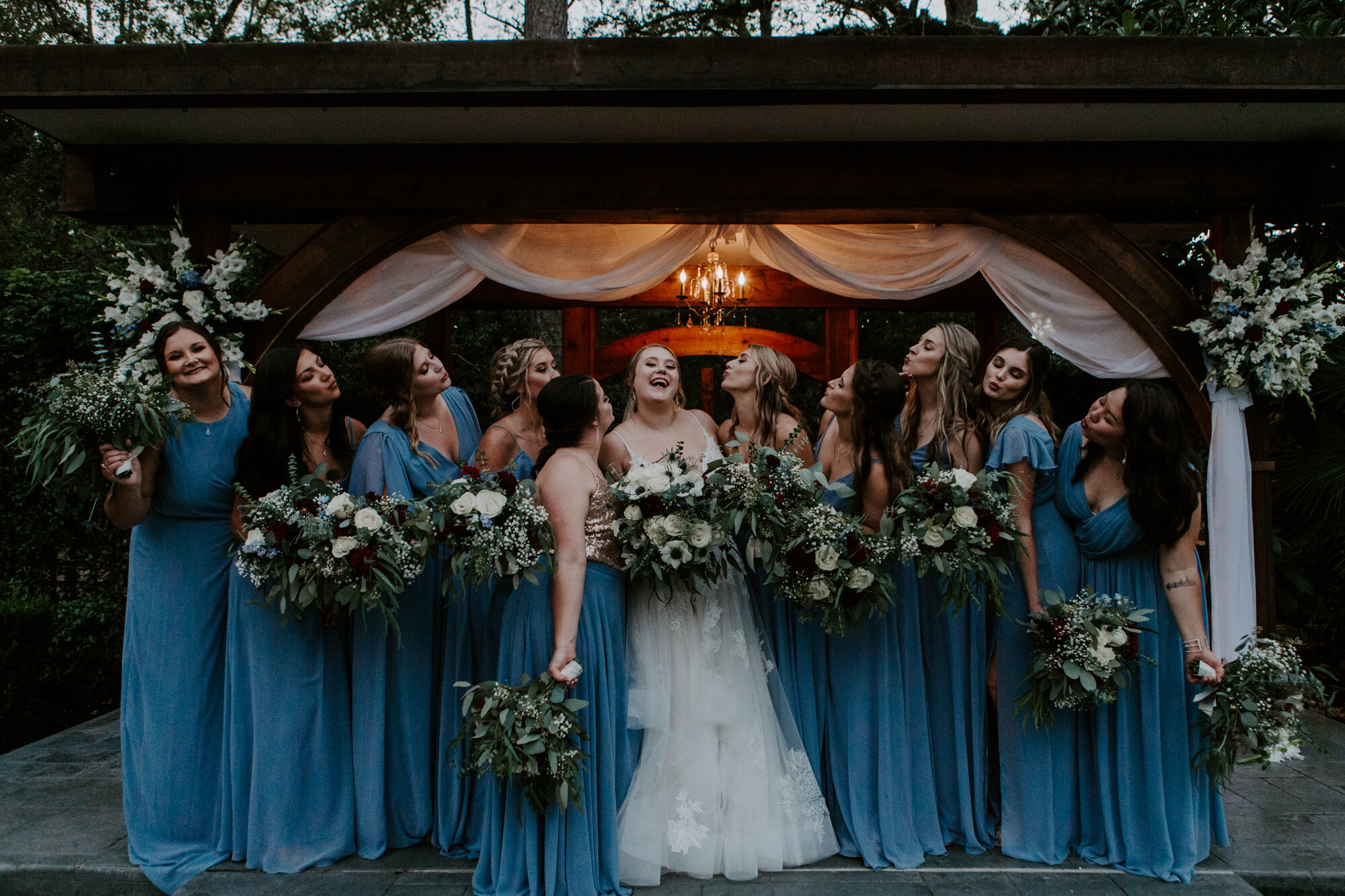 Bride and bridesmaids casually laughing. Romantic Sunset Wedding at Shirley Acres