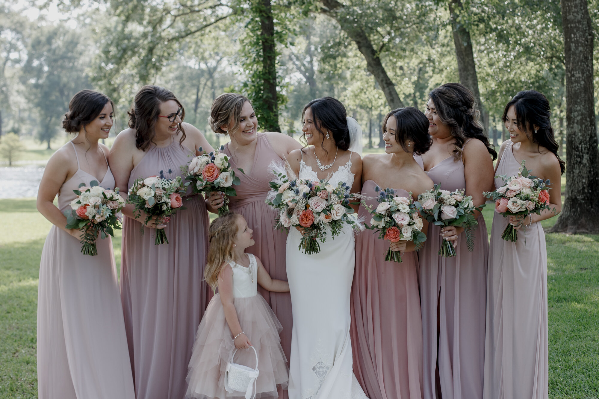Bride, bridesmaids and flower girl portraits. Romantic Chic Country Wedding at Rustic Luxury Balmorhea Events&nbsp;Venue in Magnolia, TX