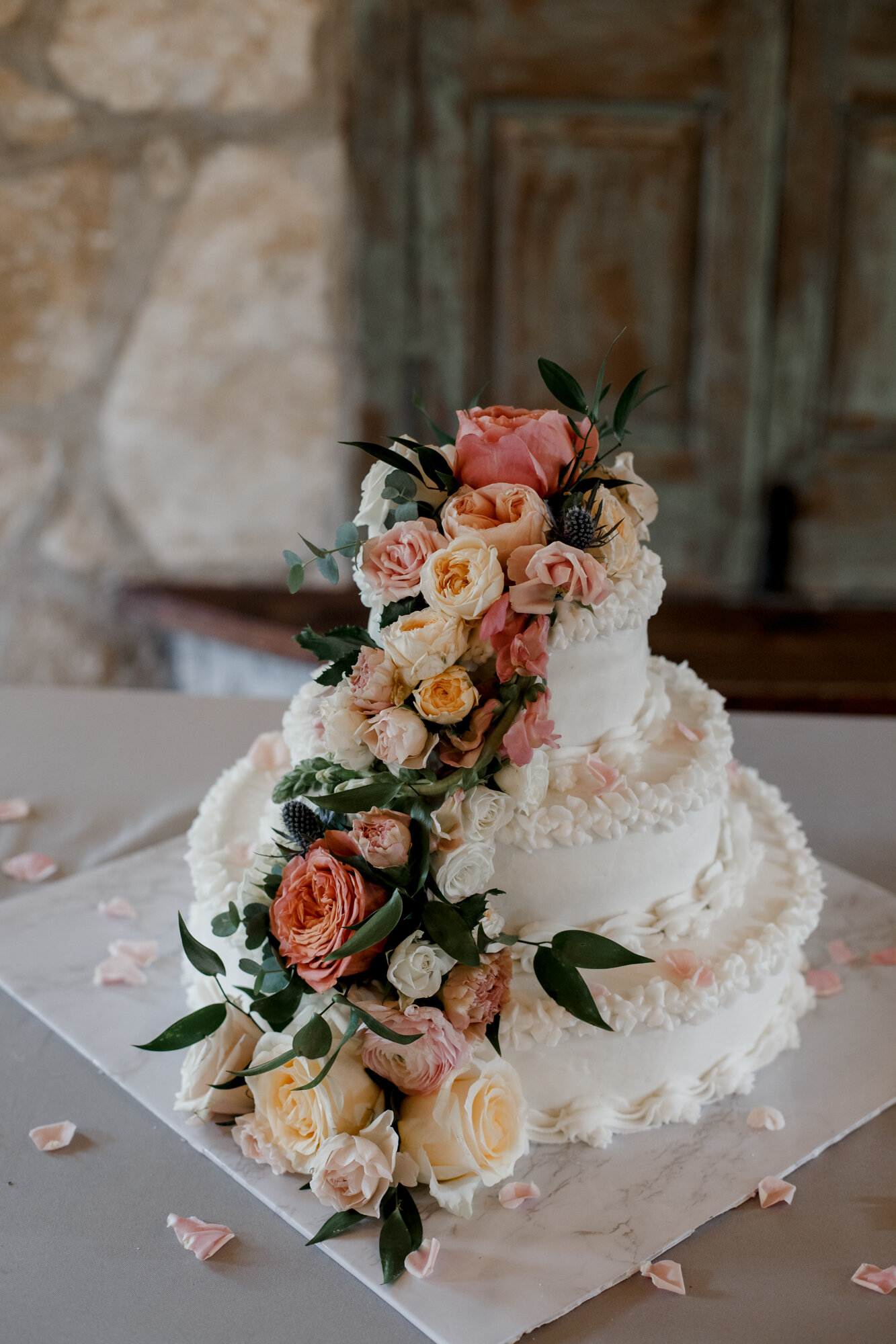 Cake decoration details. Romantic Chic Country Wedding at Rustic Luxury Balmorhea Events&nbsp;Venue in Magnolia, TX