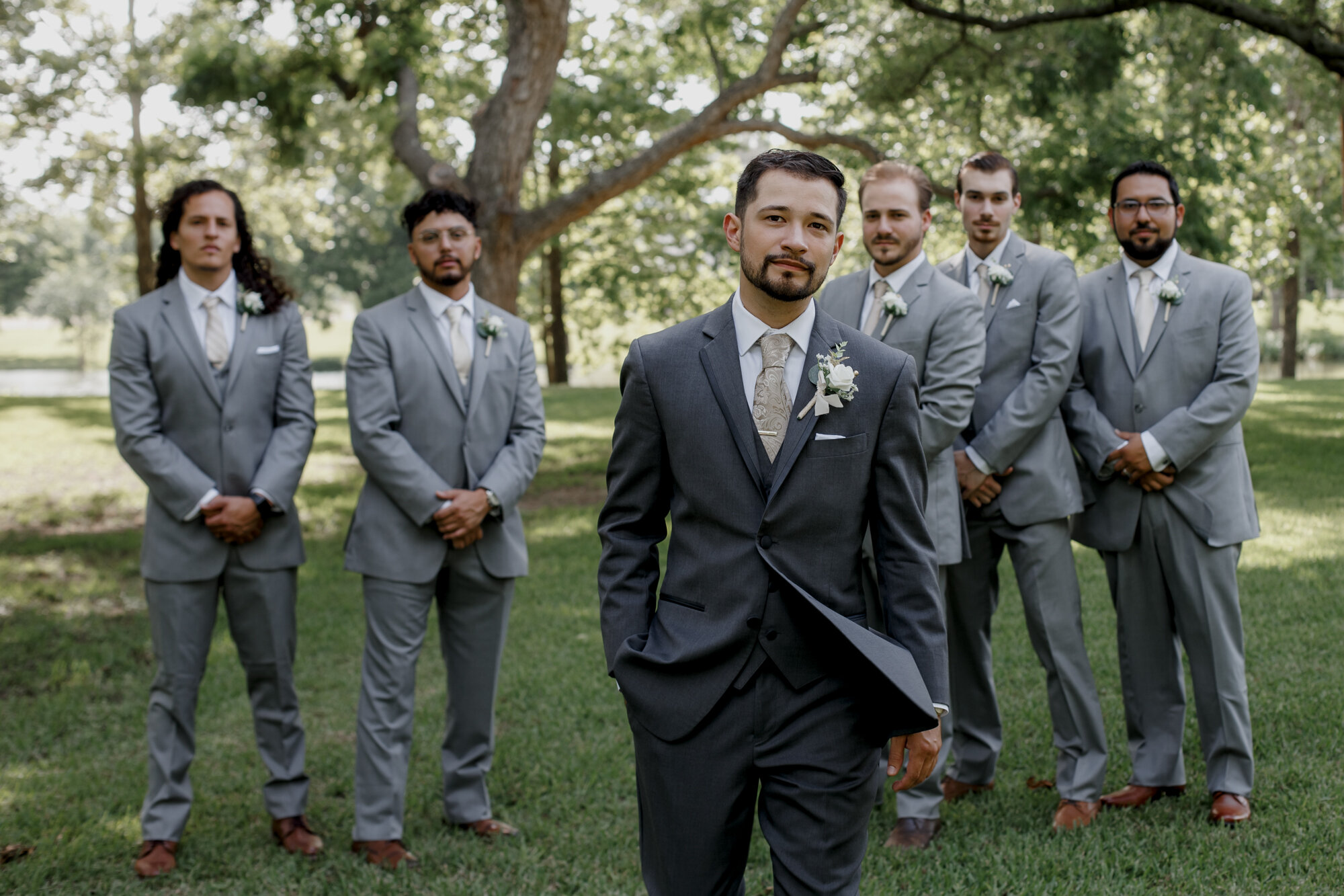 Groom and groomsmen portraits. Glowing Wedding in Golden Champagne Tones at The Orchard at Caney Creek in Wharton, TX