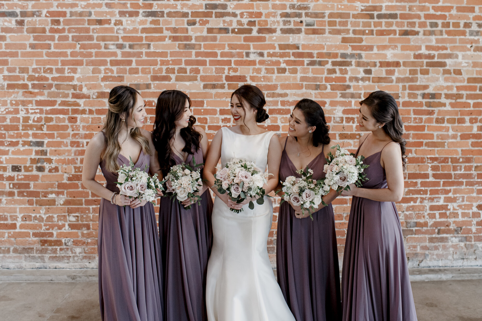 Bride and bridesmaids portraits looking at each other. Urban Elegant East Asian Wedding at Ronin 2