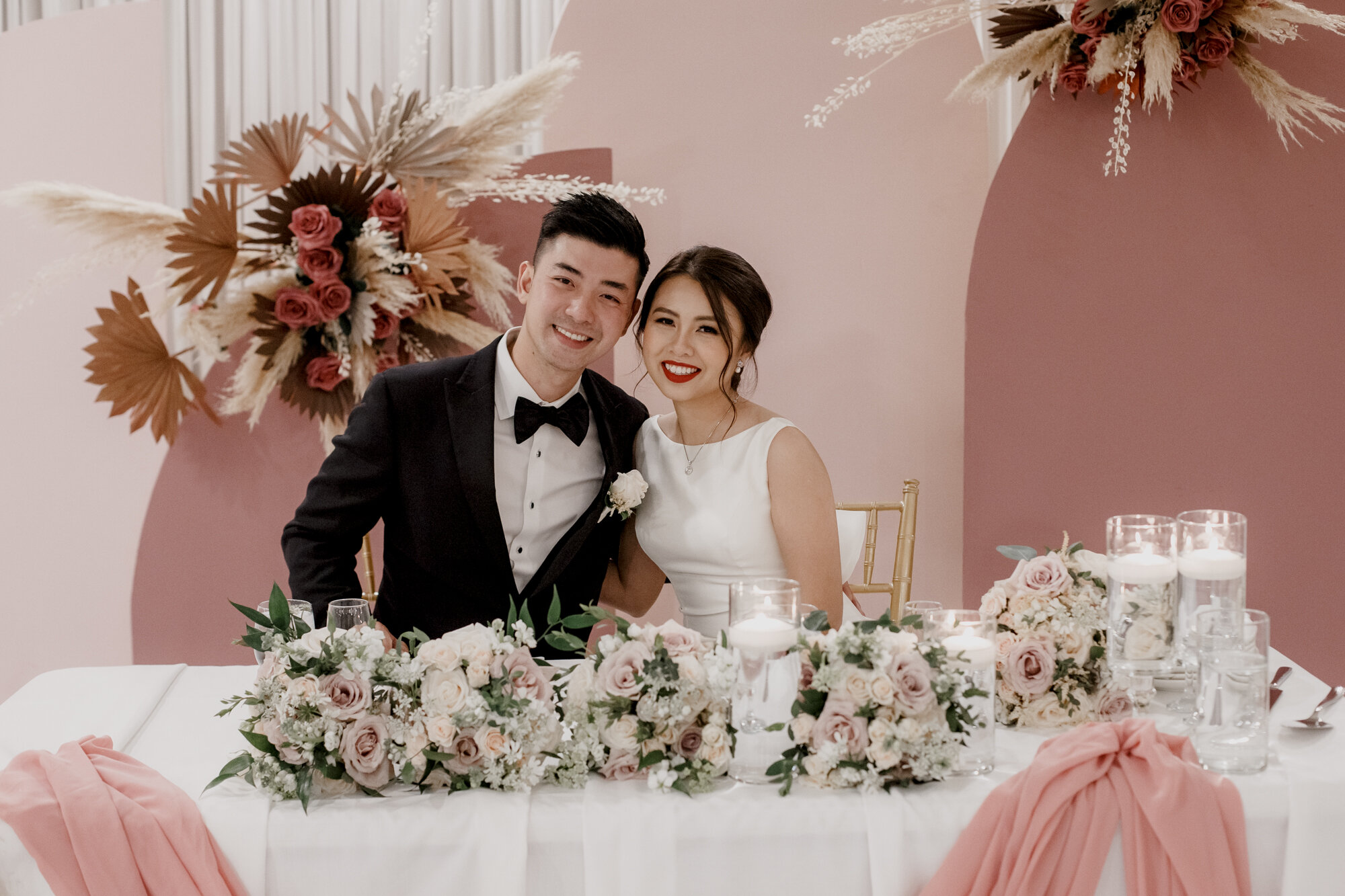 Bride and groom at the sweetheart table Urban Elegant East Asian Wedding at Chateau De L’Amour