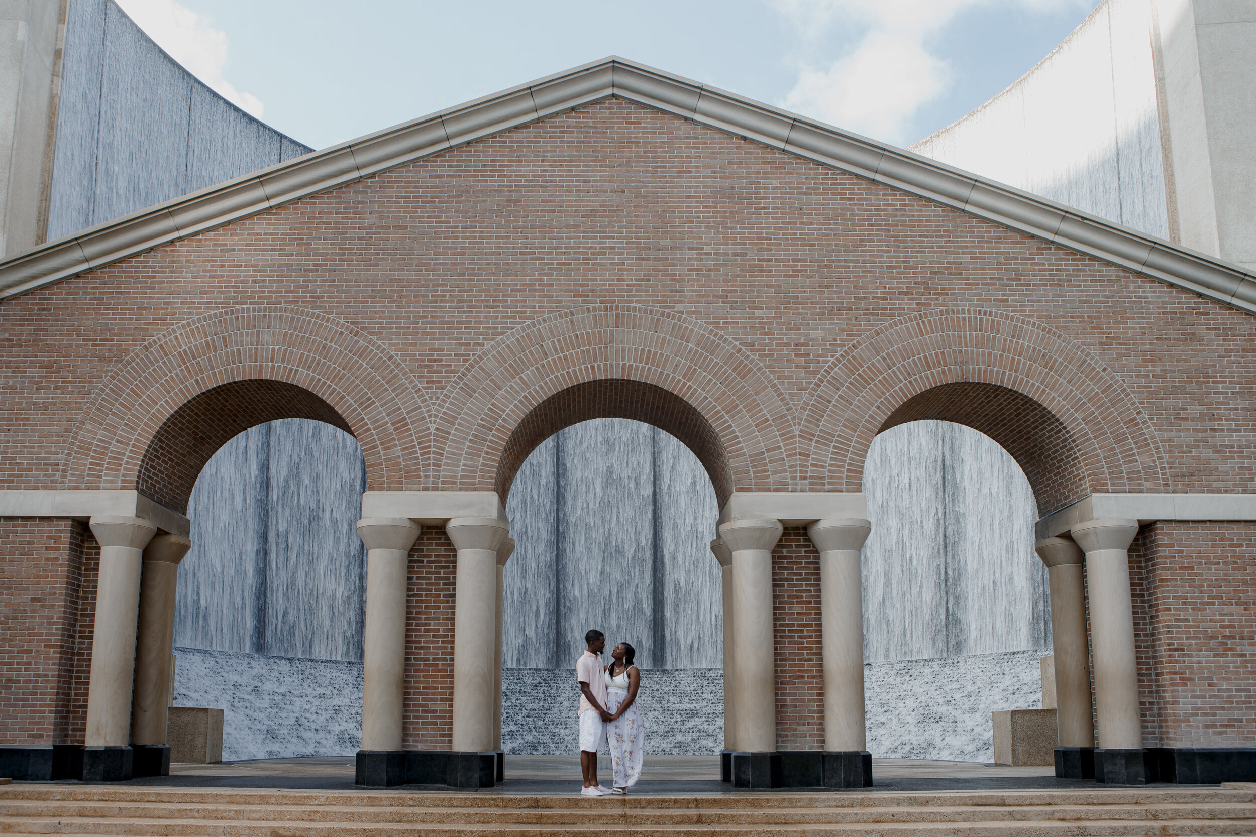 Couple kissing. Early Morning Engagement Photo Session at Waterwall Place