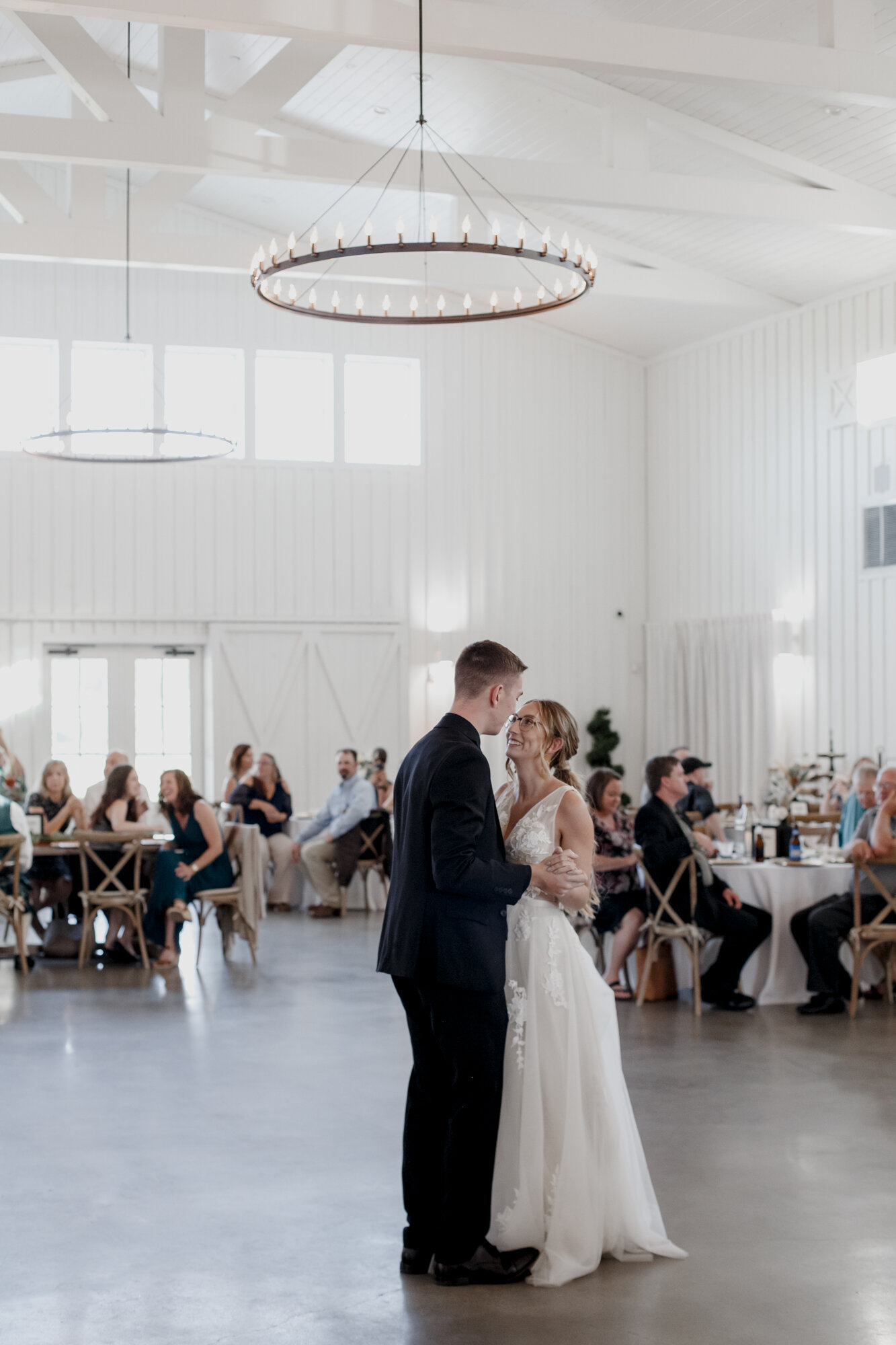 Bride and groom first dance. Burnt Orange and Black Fall Wedding at The Farmhouse