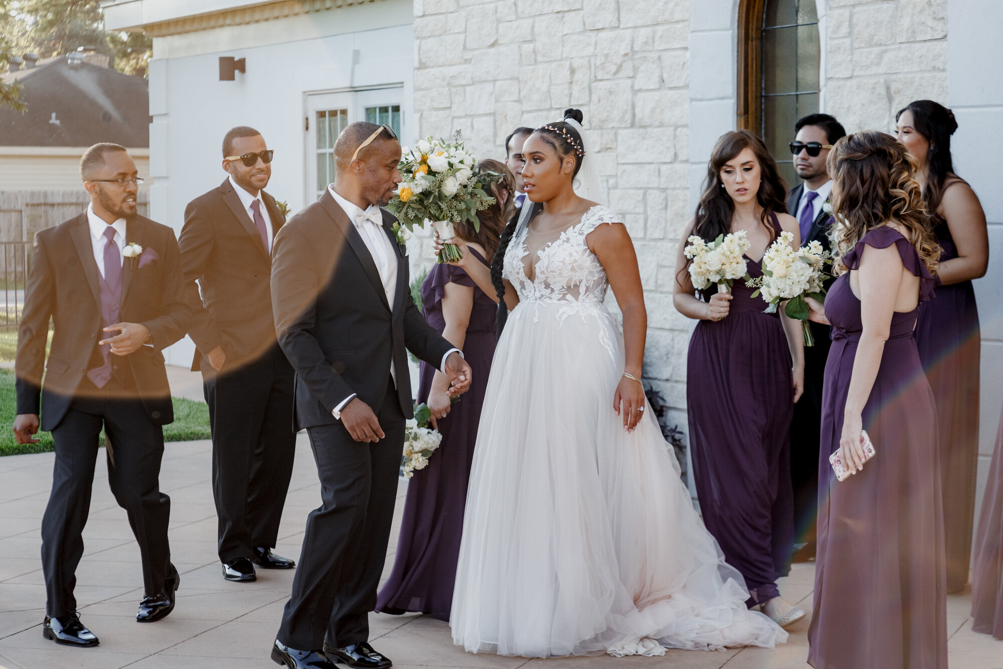 Bride and groom with bridal party behind the scenes. Wedding at Ashton Gardens WElegant and Dazzling Wedding in Yellow and Purple at Ashton Gardens Westest (Houston, TX)