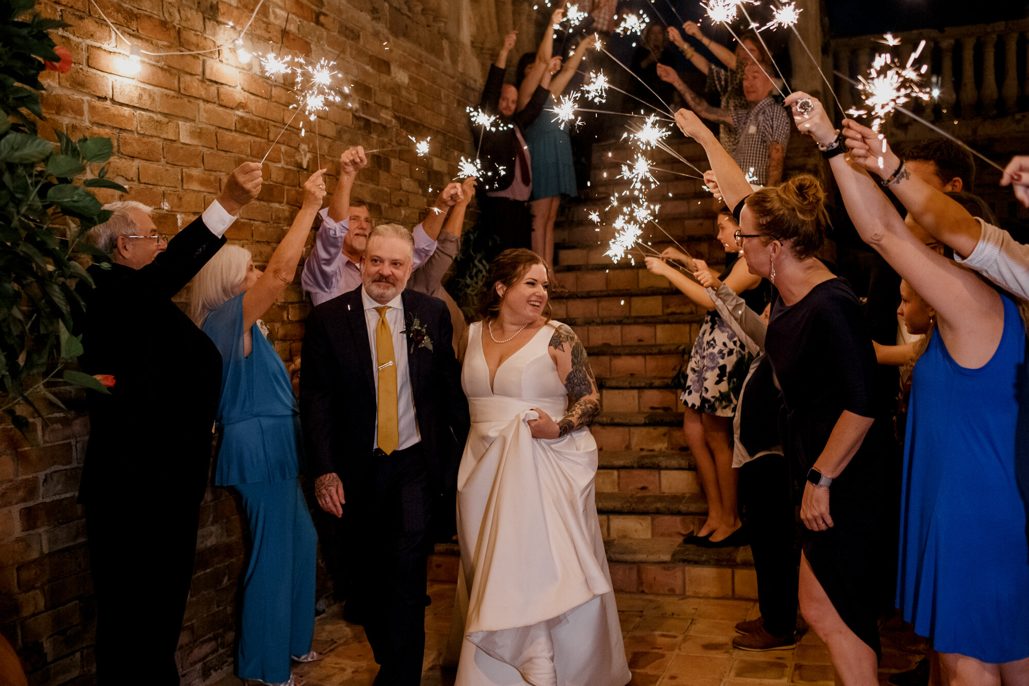 Bride and groom send off grand exit with sparklers. Rock Star Wedding at The Gallery
