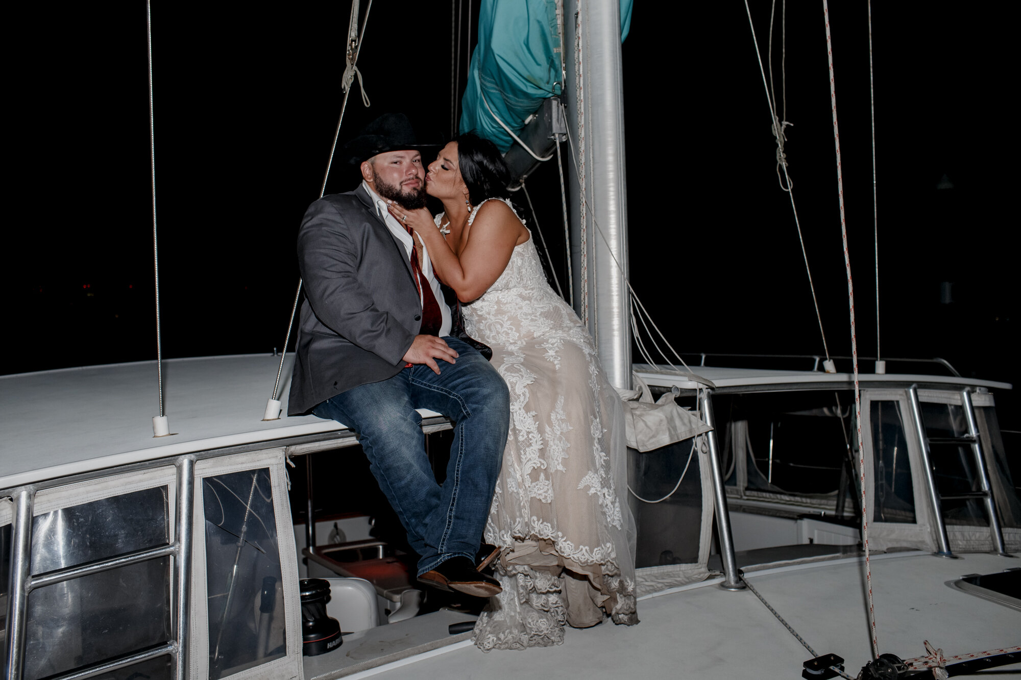 Bride and groom send off on a boat. Fun and Glowing Wedding at Sea Star Base