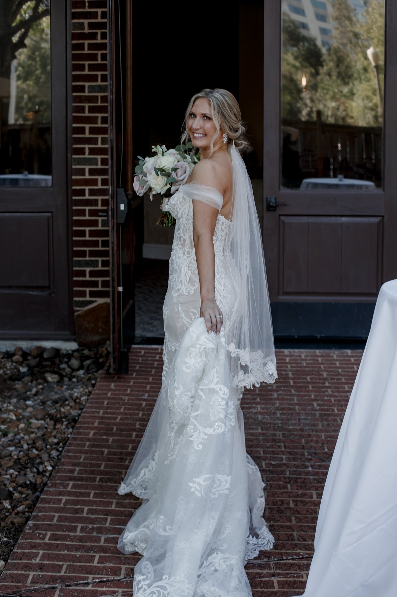 Outdoors Bridal portraits. Elegant and Glamorous Uptown Wedding at Omni Houston Hotel and The Wynden