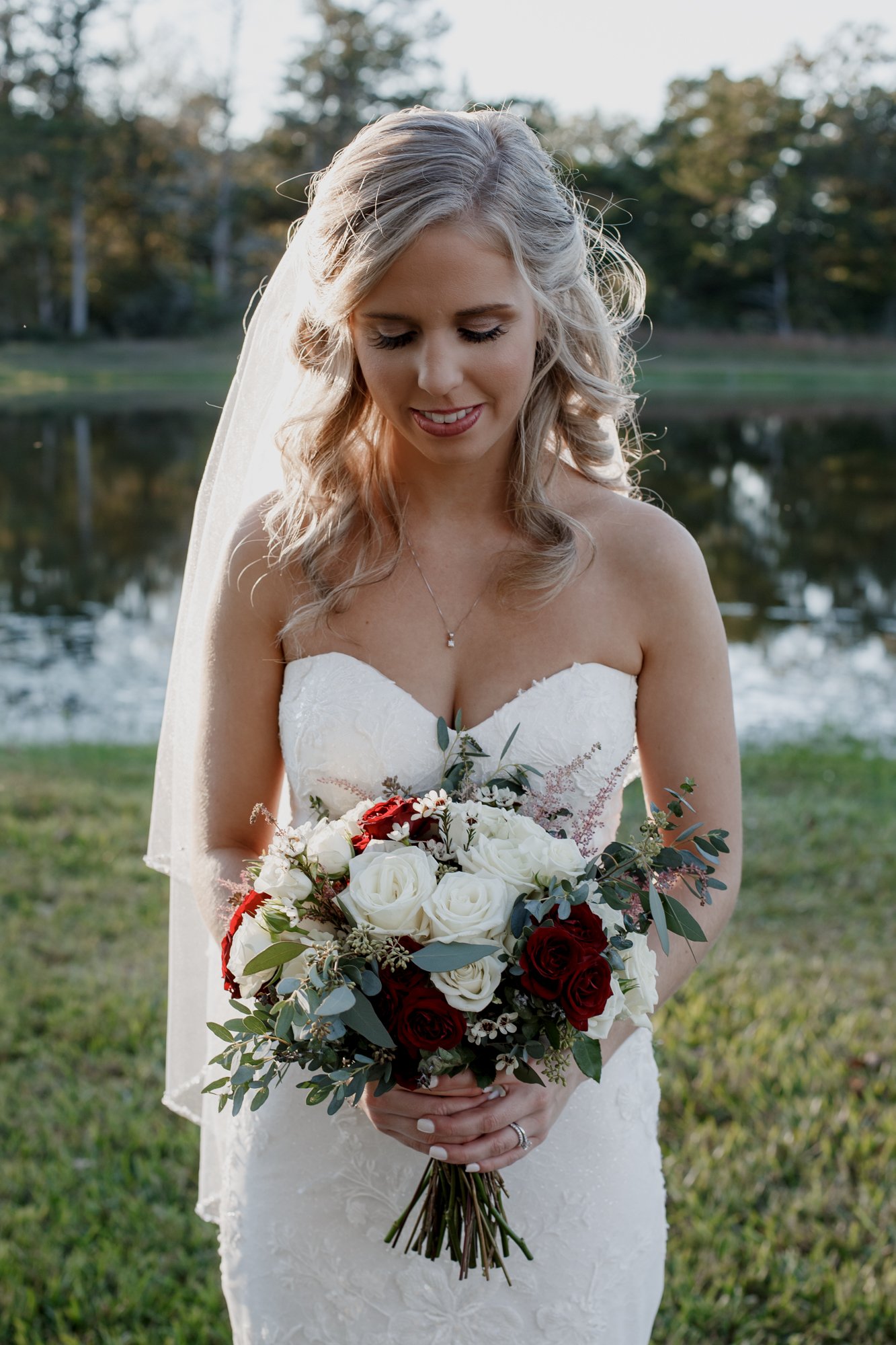 Sunset bridal portraits by the lake. Wedding at The Vine (New Ulm, TX)