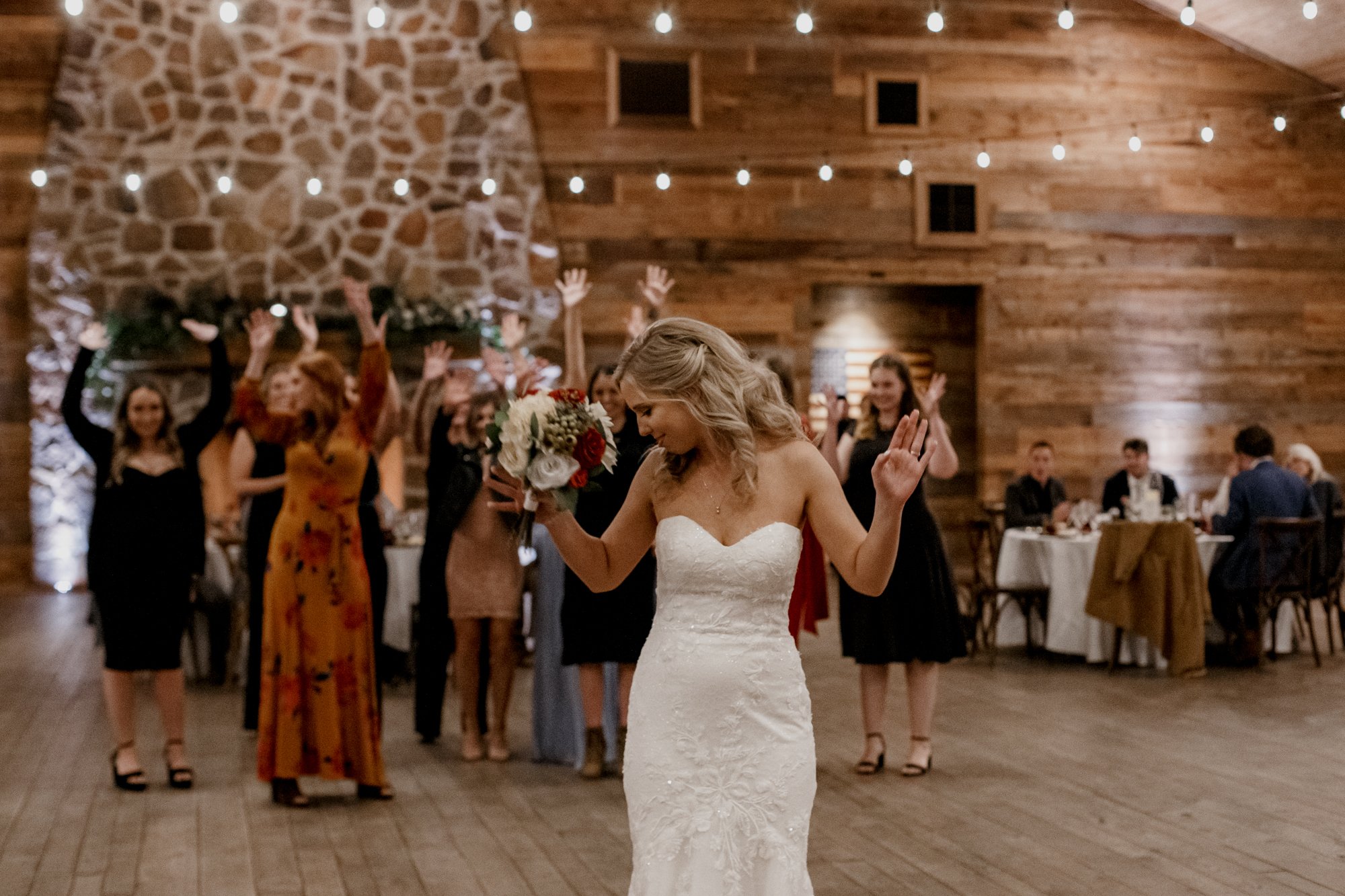 Bouquet toss. Wedding at The Vine (New Ulm, TX)