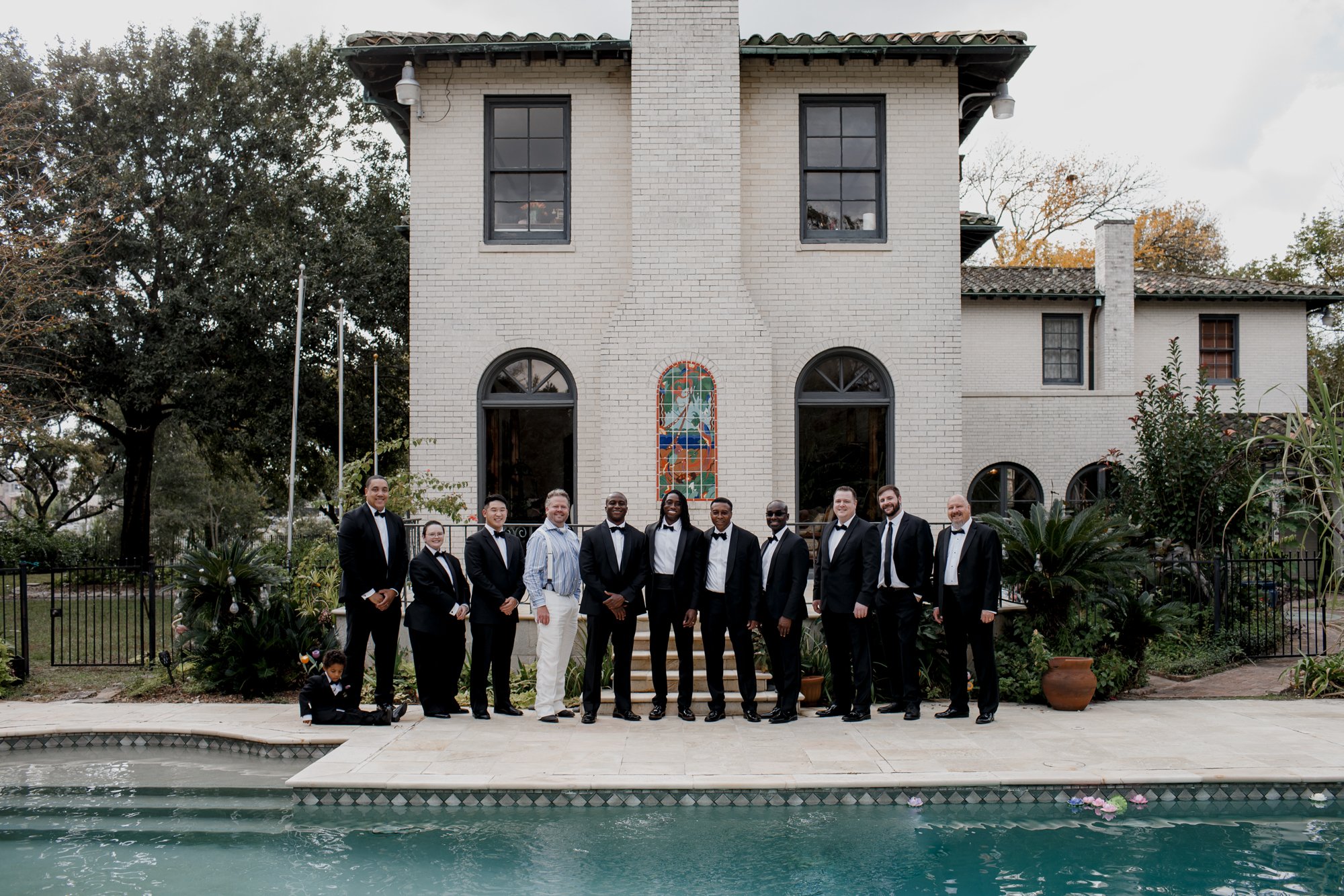 Private house groom and groomsmen by the pool. New Orleans Style Wedding at McGovern Centennial Gardens 