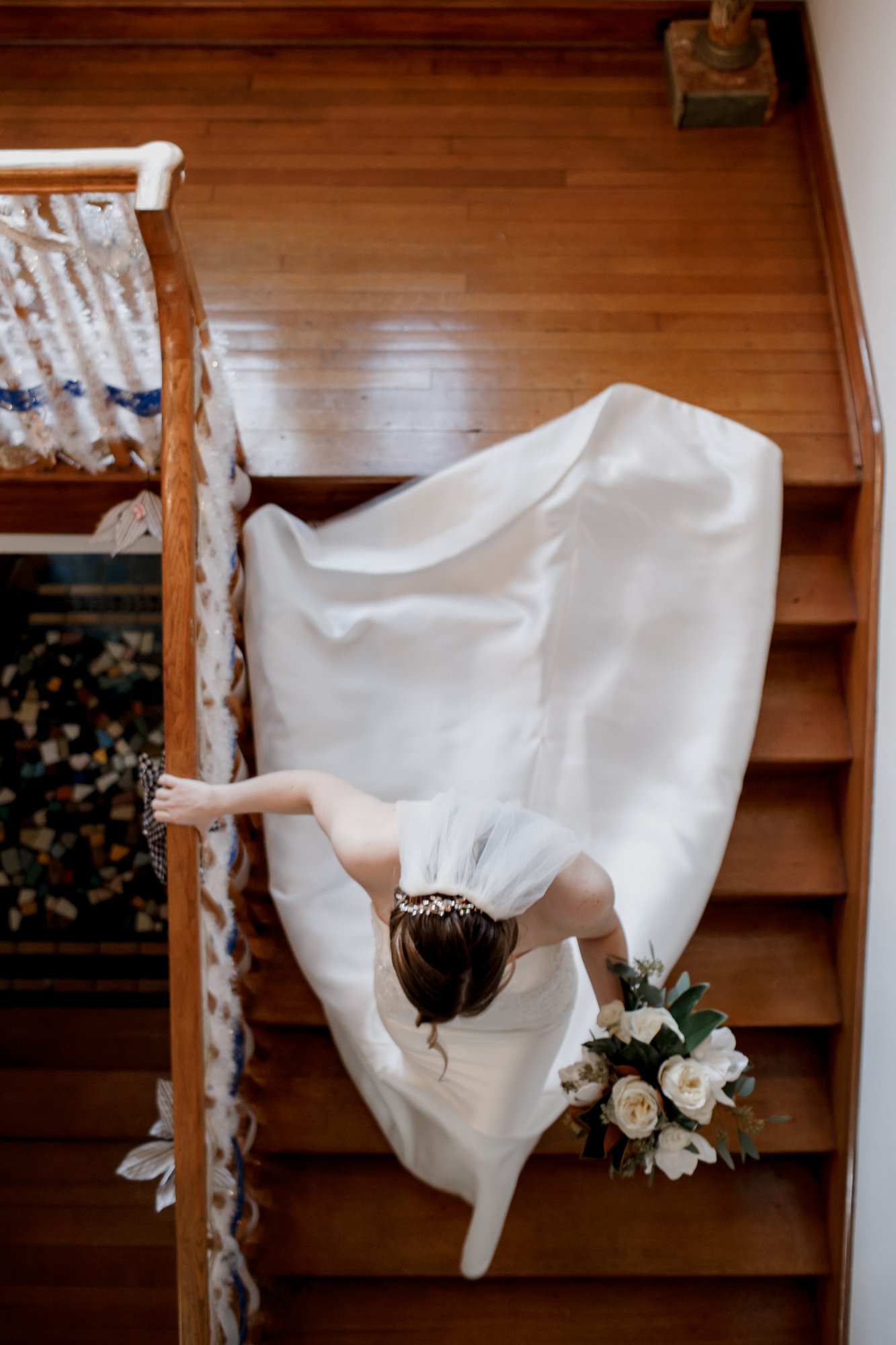 Private house bride walks down the stairs. New Orleans Style Wedding at McGovern Centennial Gardens