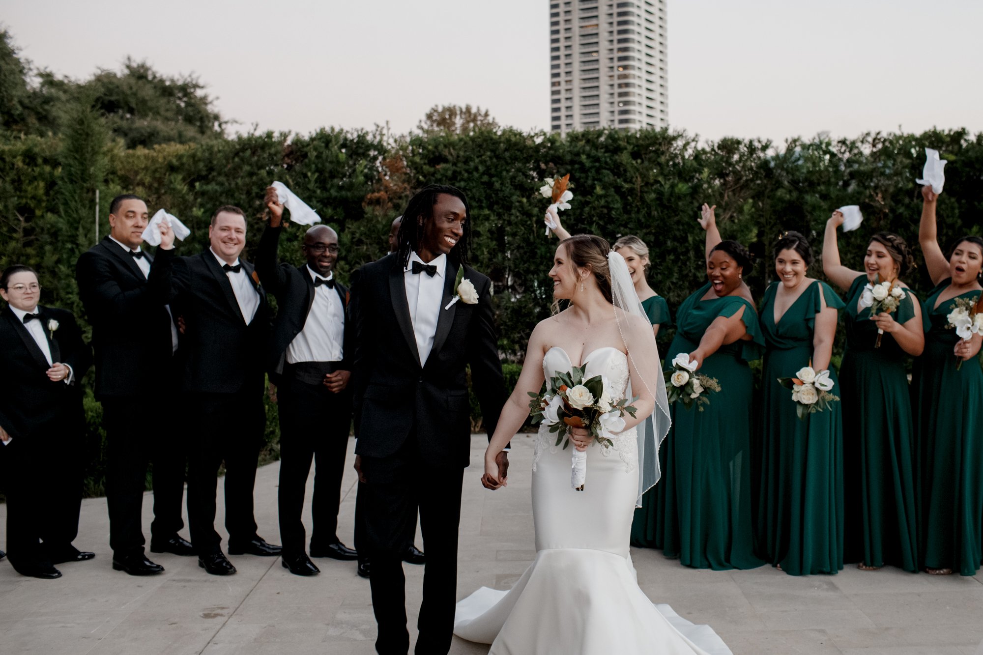 Bride and groom with bridal party. New Orleans Style Wedding at McGovern Centennial Gardens (Houston, TX)