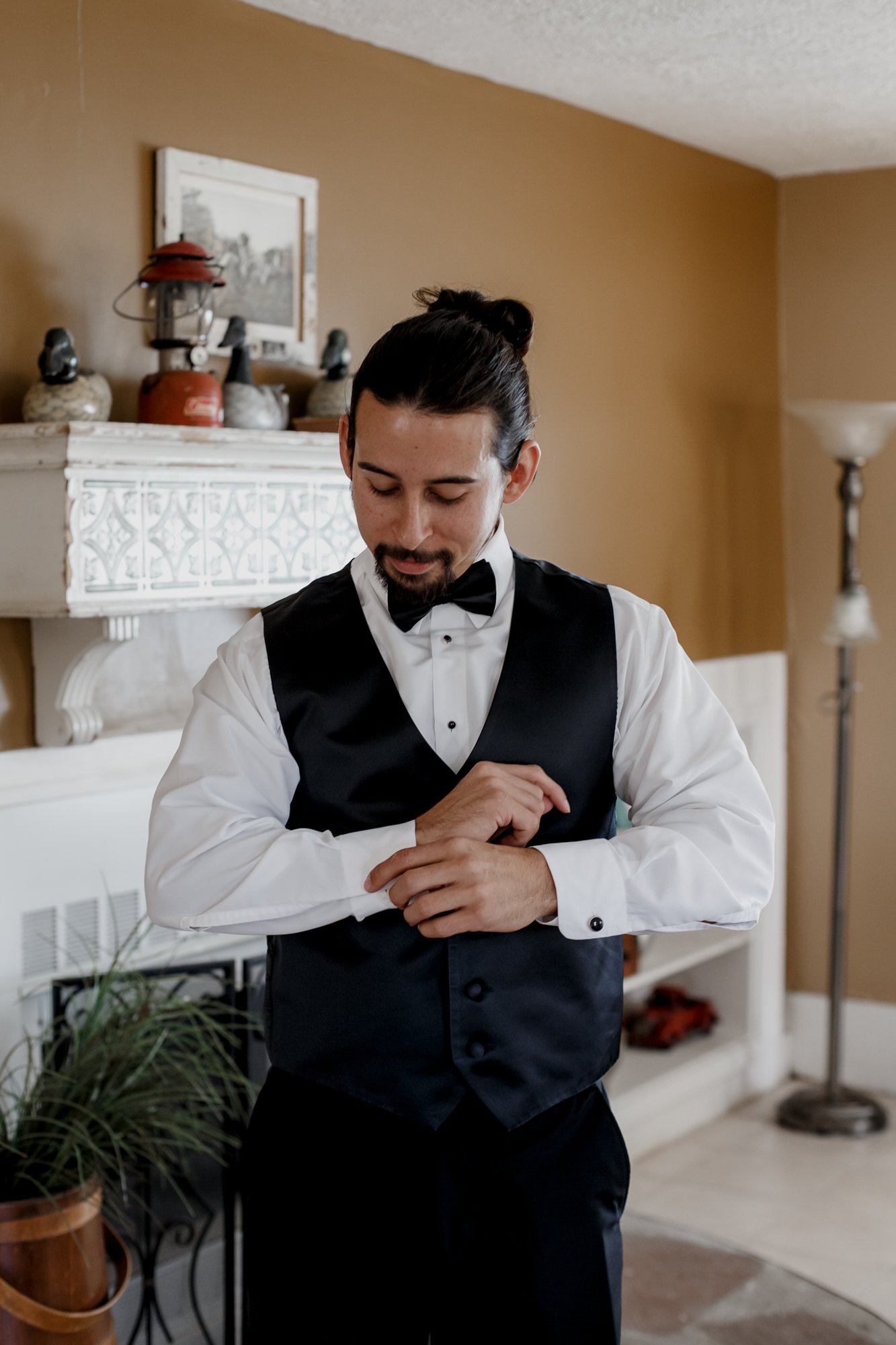 Preparations groom getting ready. Fall Time Wedding in Gold at The Grand Texana (Hempstead, TX)