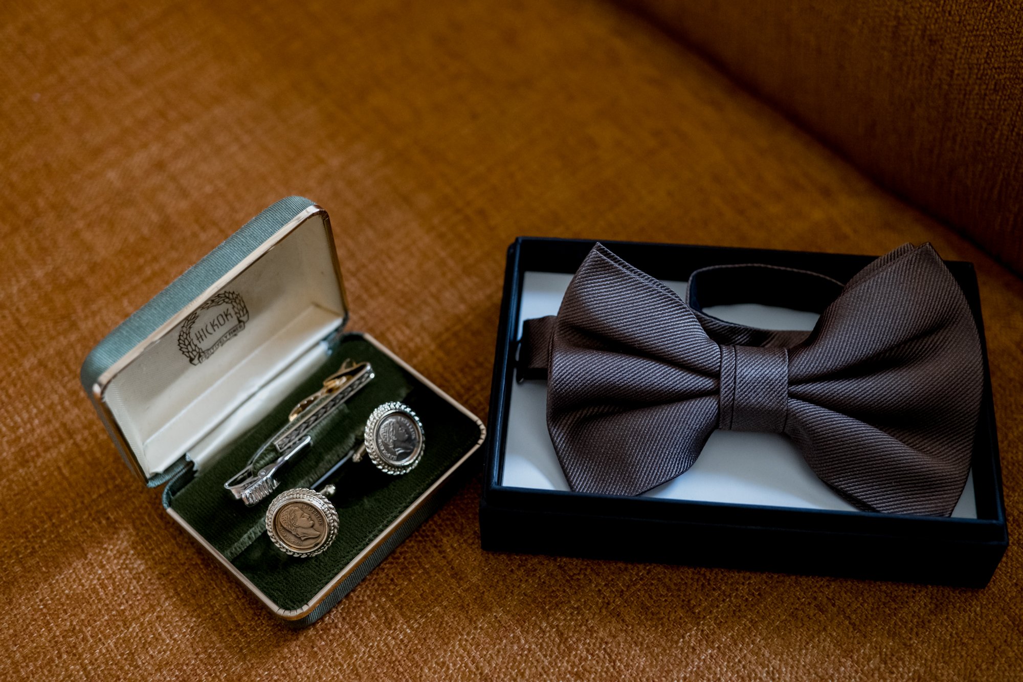 Groom preparations getting ready bow tie and cufflinks details. Wedding at Hotel Icon