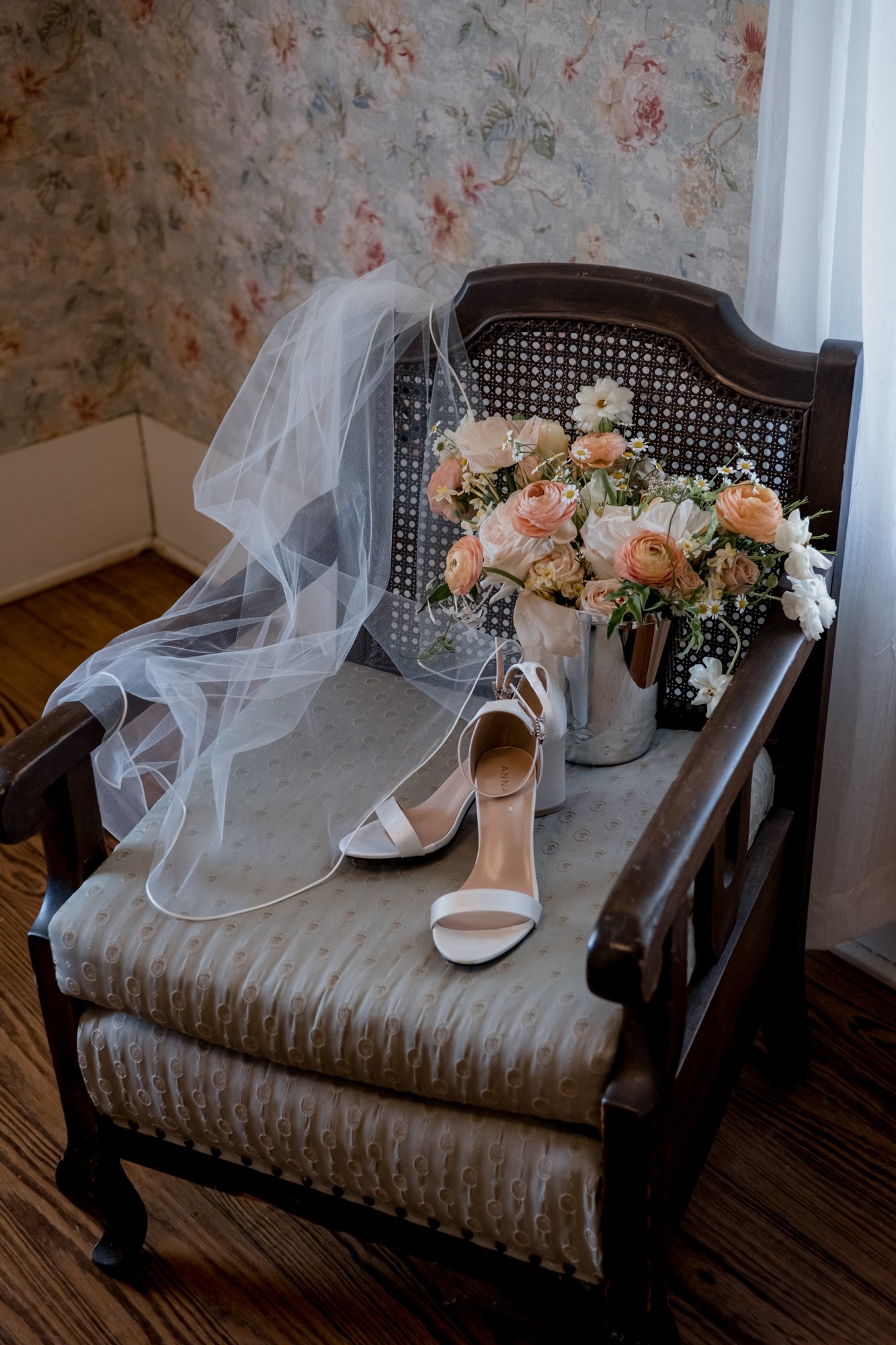 Wedding veil, shoes and bouquet. Bridal Preparations at Antique Rose Emporium