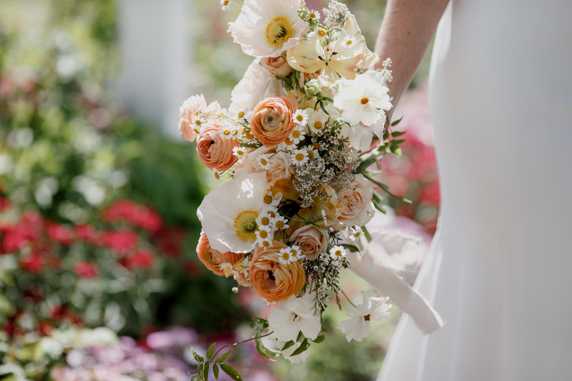 Airy close up of bridal bouquet. Wedding at Antique Rose Emporium
