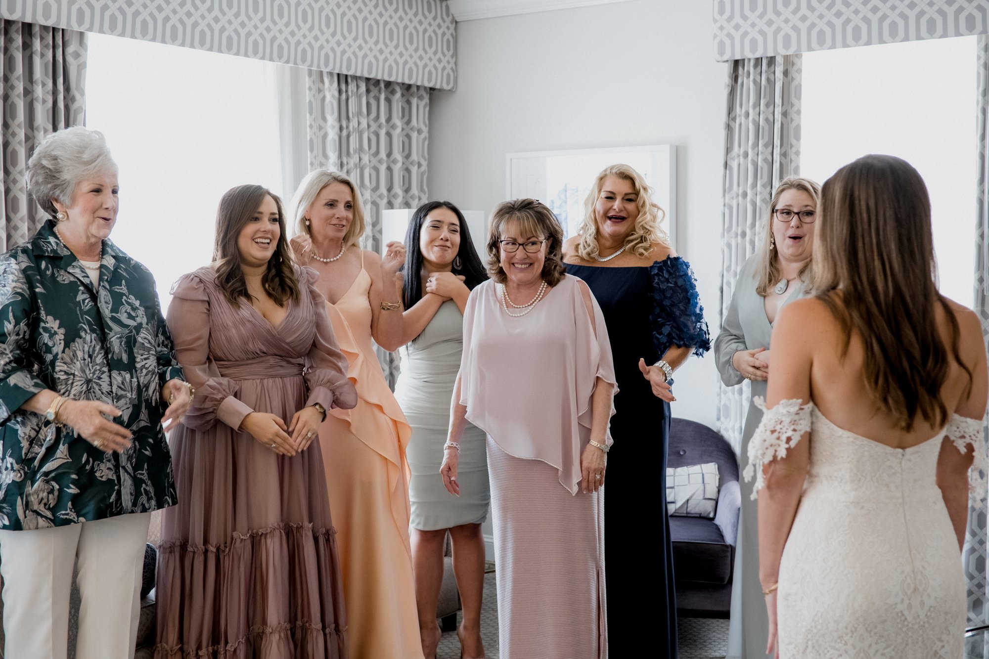 Bridesmaids reaction first look with Bride at Lancaster Hotel