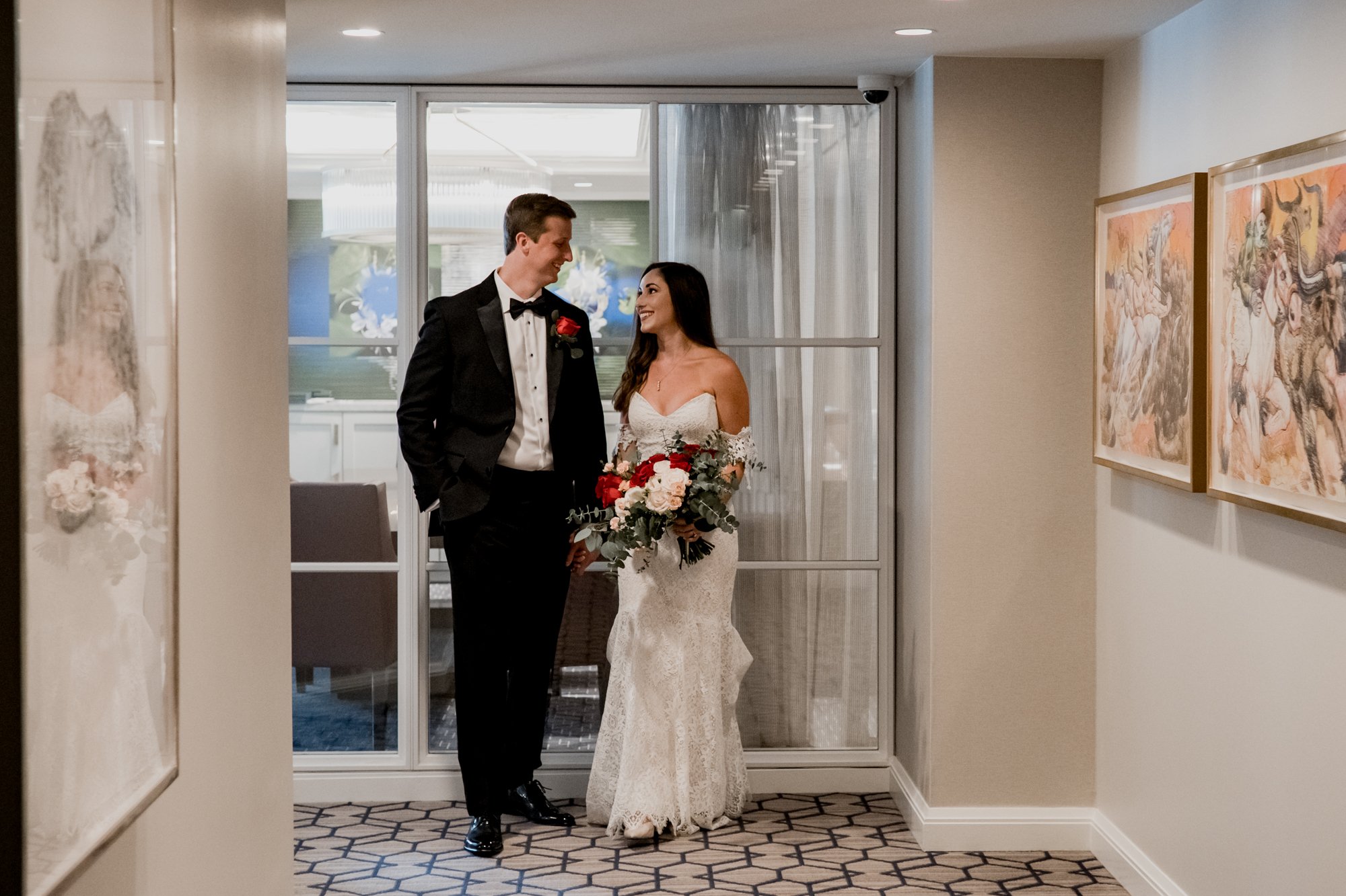 Bride and groom walking at Lancaster Hotel