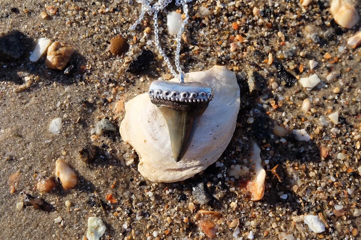 Ride The Waves! This fossil mako shark tooth pendant is a beauty! I tried something new with this wave pattern - it&rsquo;s seems to have really worked out! It looks stunning with the contrast of the highs and lows. This pendant measures in at 1.75 i