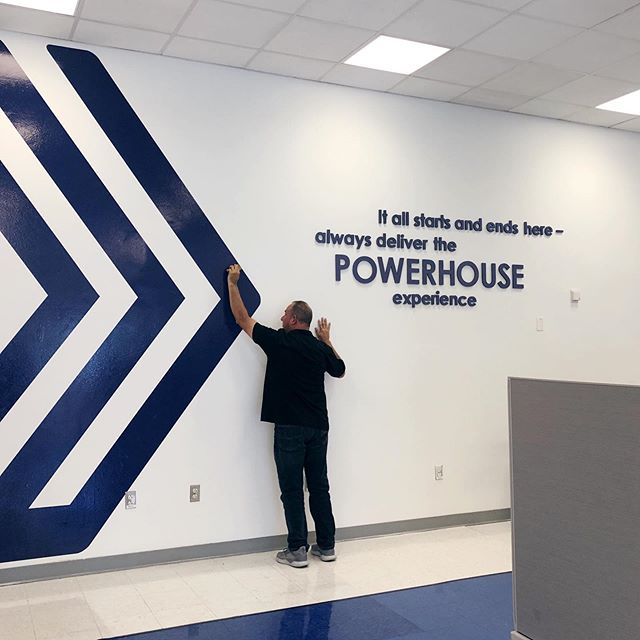 If our walls could talk...as we continue to settle into our new corporate headquarters, environmental branding with bold, fun and powerful messages are going up to showcase our commitment to our associates and our clients