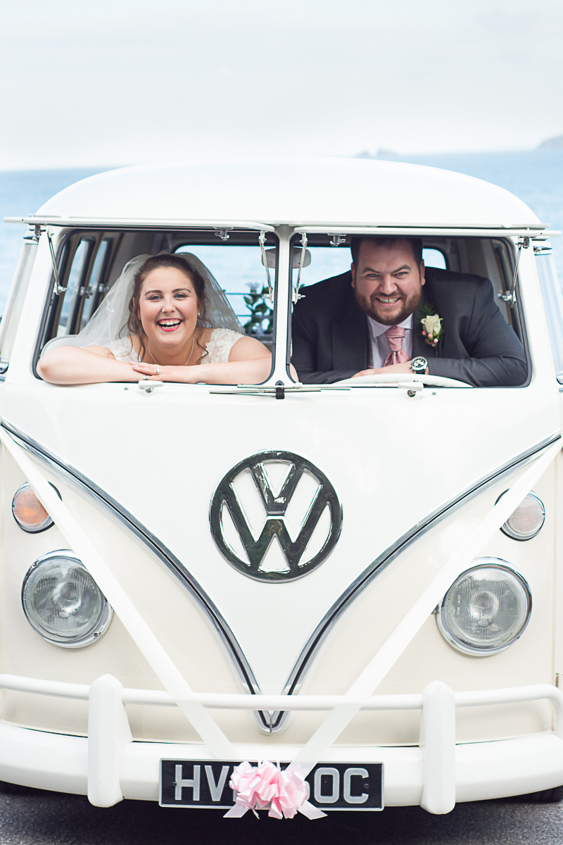 bride and groom in their campervan at the carbis bay hotel