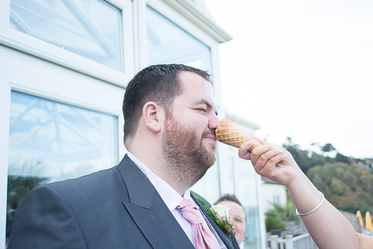 groom gets icecream on his nose at carbis bay cornwall