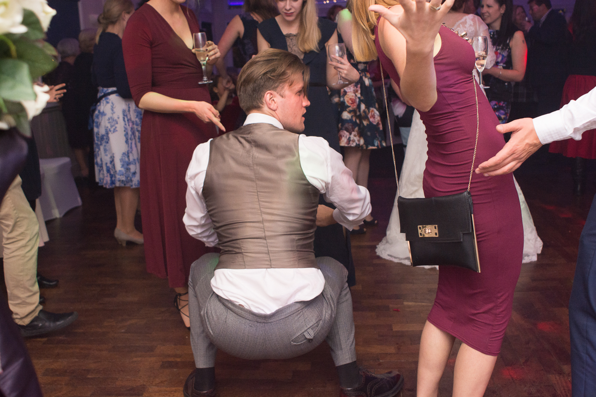 throwing some shapes at a whitsand bay fort wedding