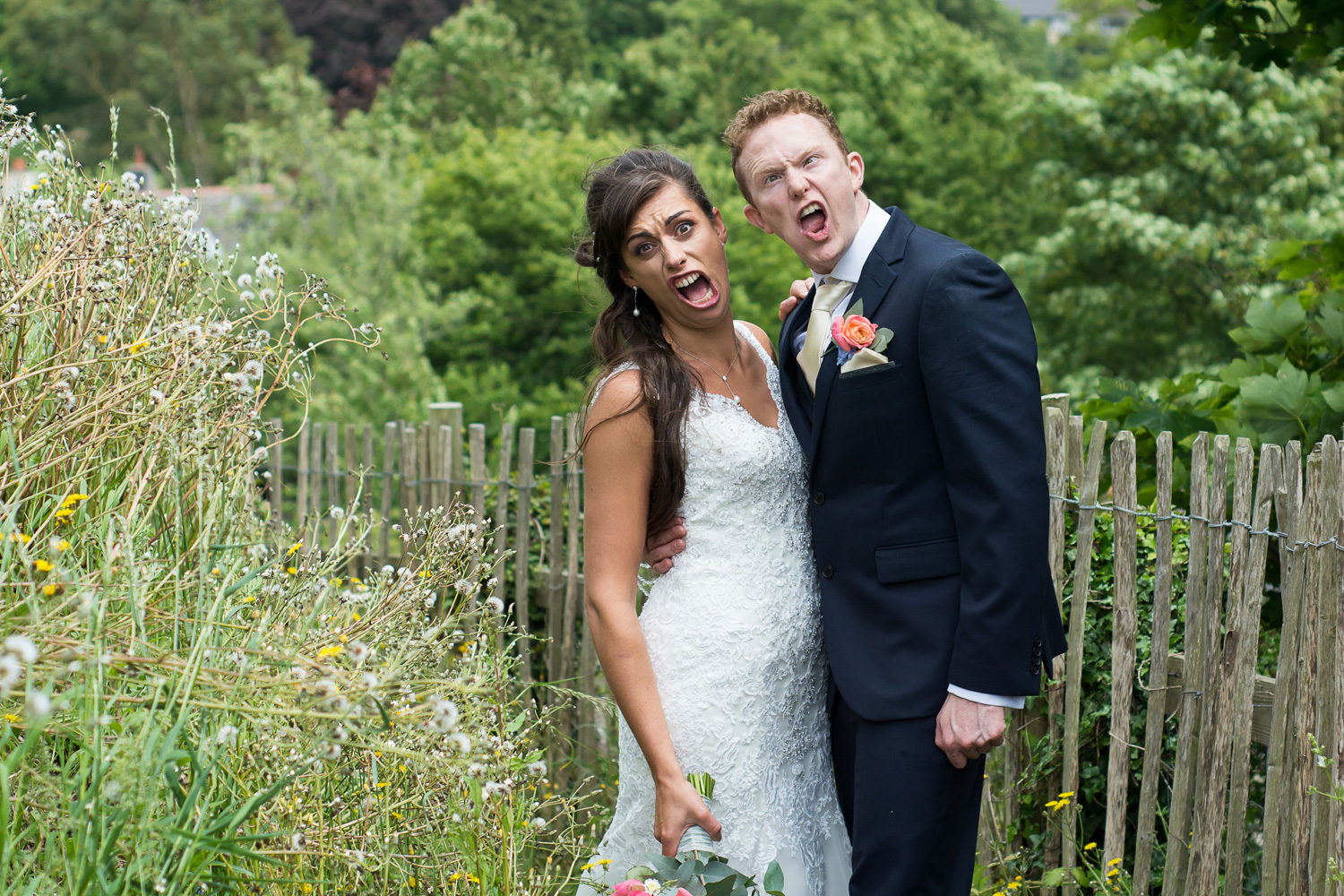 silly faces at their plymouth wedding