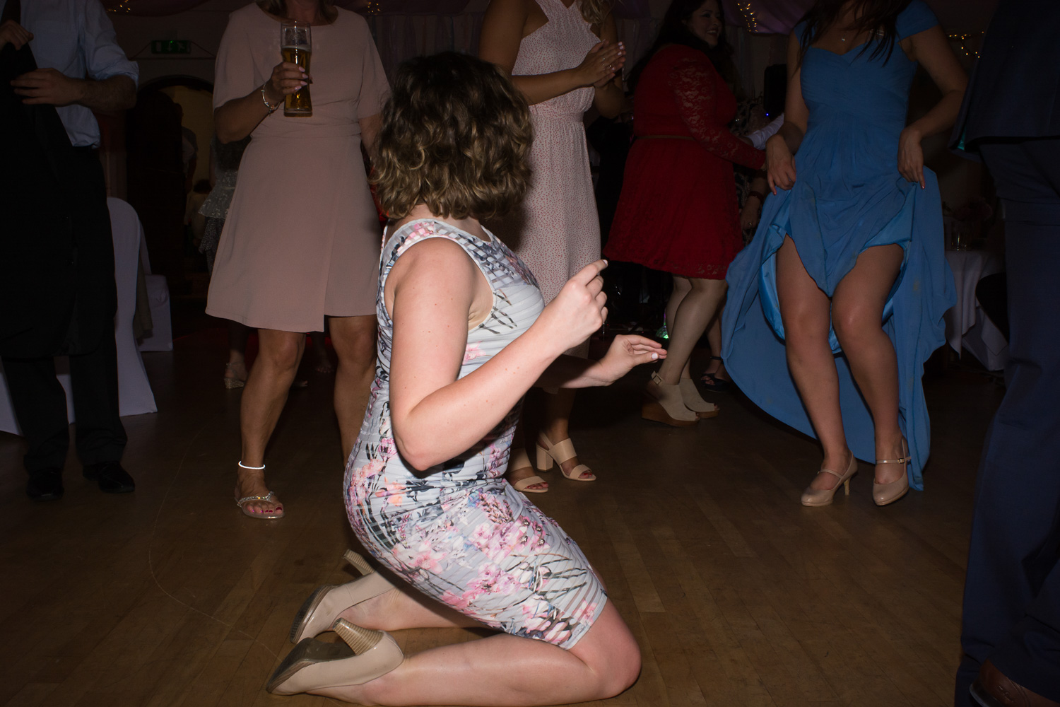 knee slide on the dancefloor at Boringdon Hall Plymouth wedding