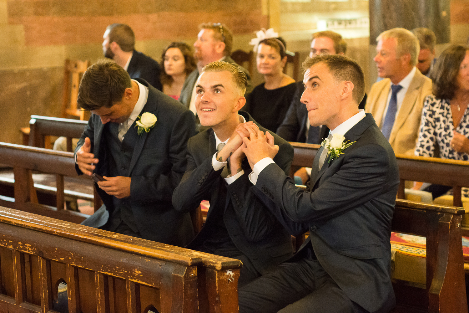 The groom and his brother knock one out of the park at All saints church in Torquay, Devon