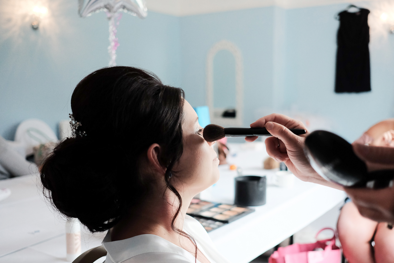 bride having makeup done at the lord haldon hotel in devon