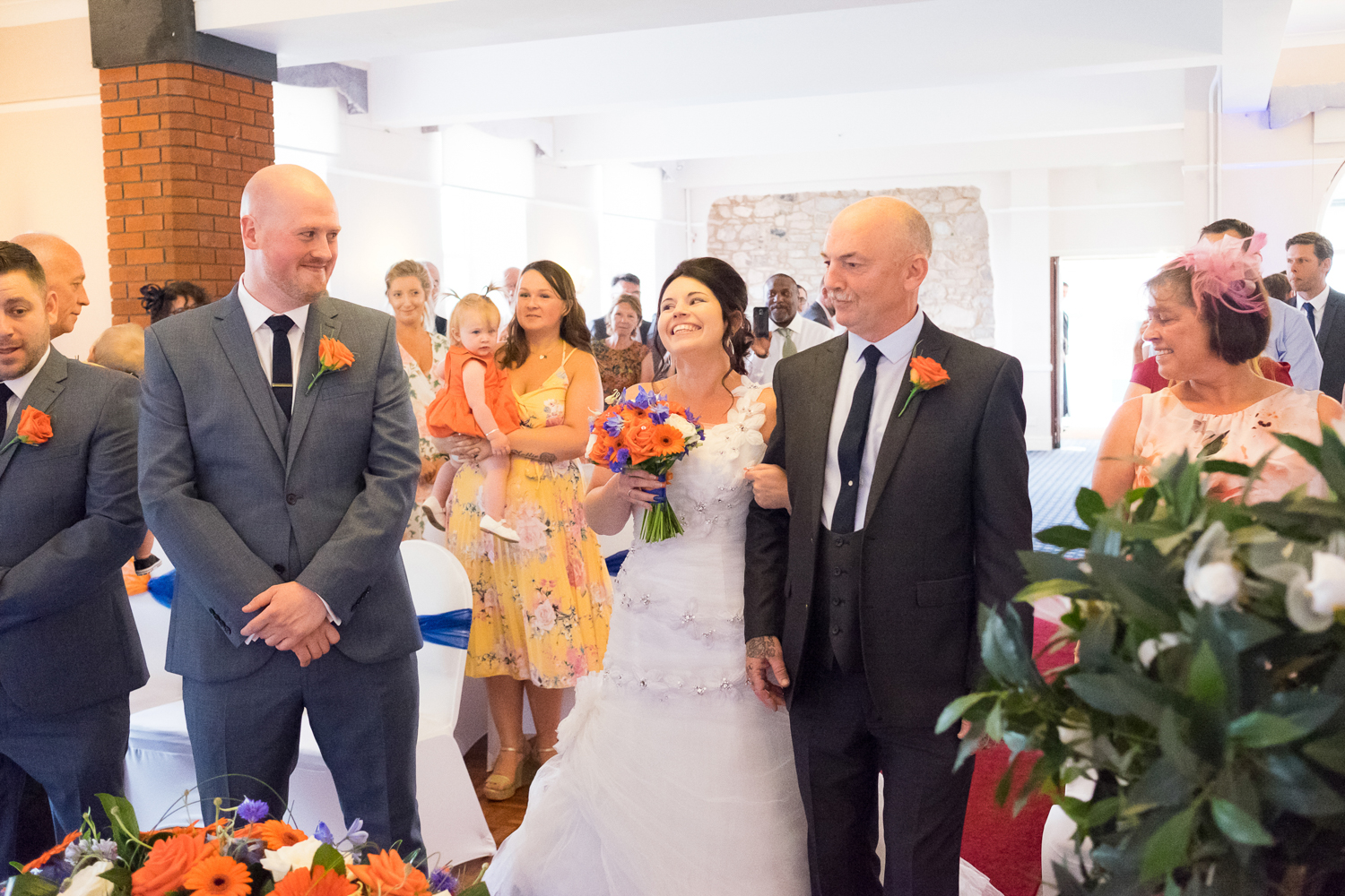 walking down the aisle at The Lord Haldon Hotel in Devon