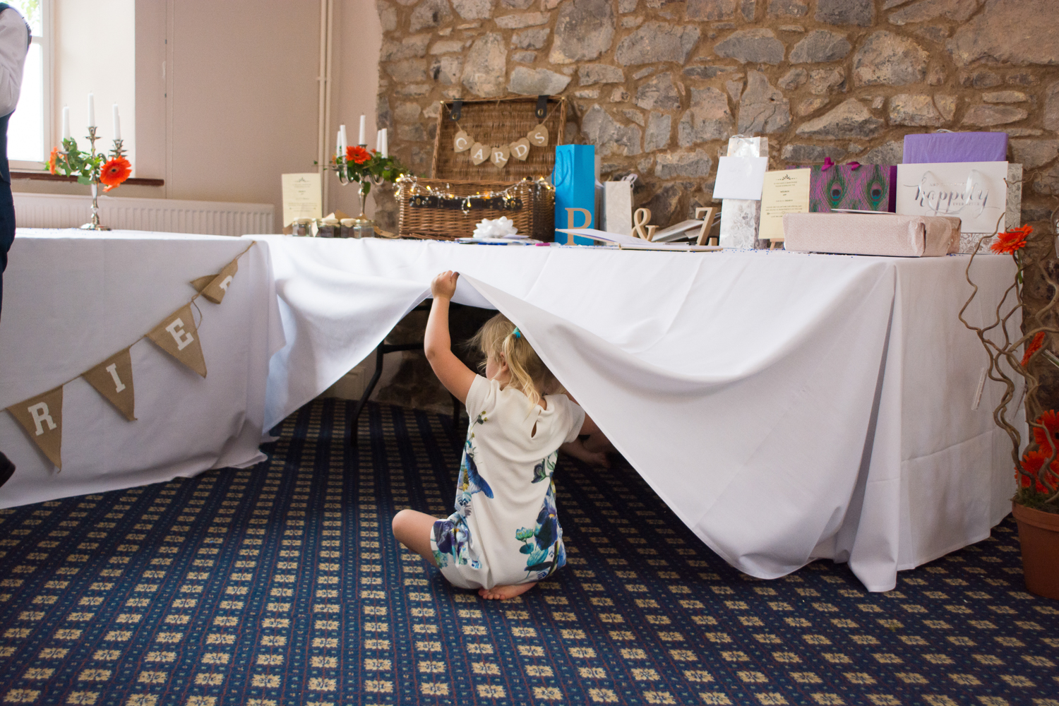 children play under the table at The Lord Haldon Hotel in Devon