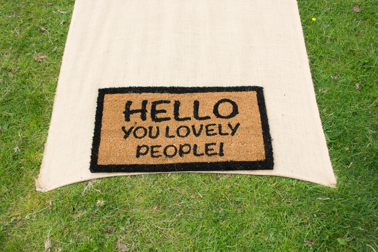 outside door mat reads, Hello you lovely people in woolacombe