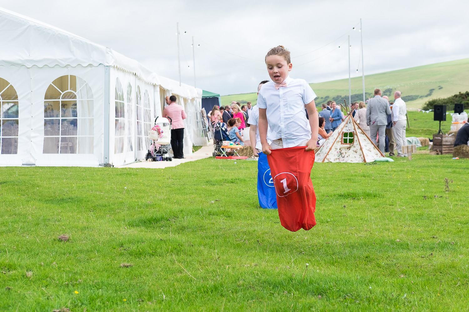 sack races at festival wedding in woolacombe