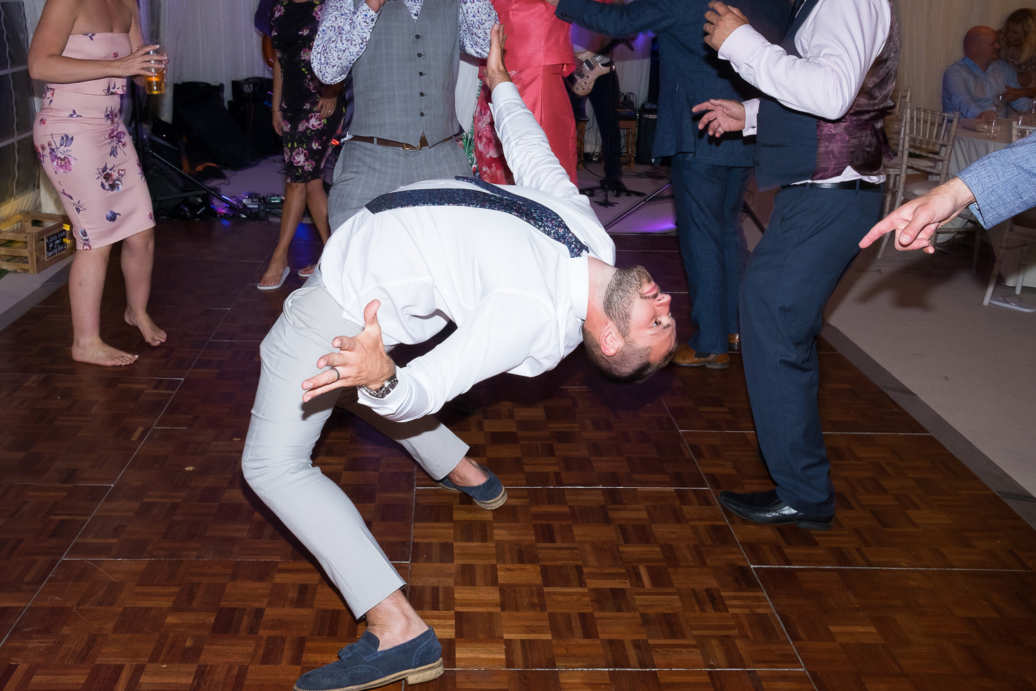 crazy shapes on the dancefloor at woolacombe wedding