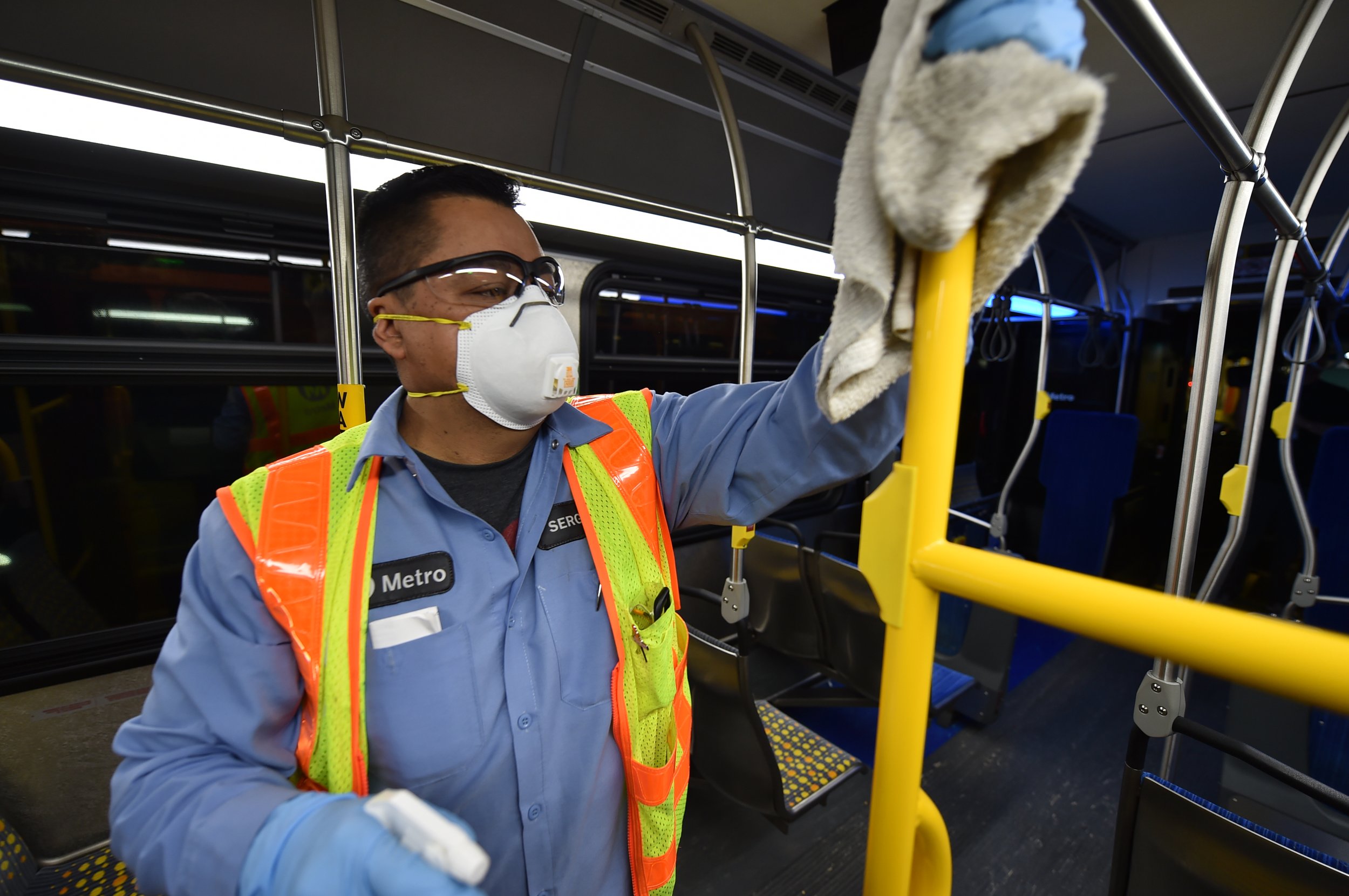  Metro Service Attendant Cleaning Bus during COVID Pandemic 