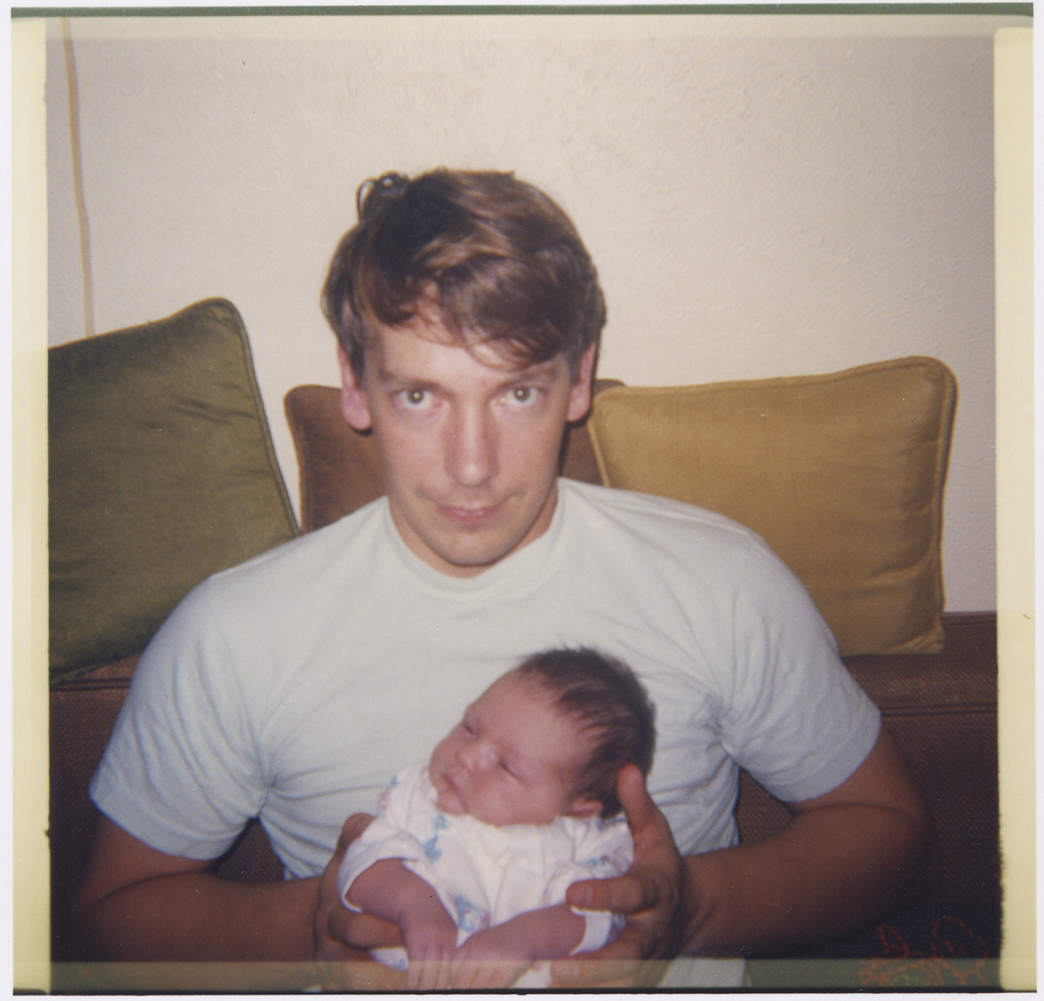 Buddy, with his newborn daughter, Ondrea.