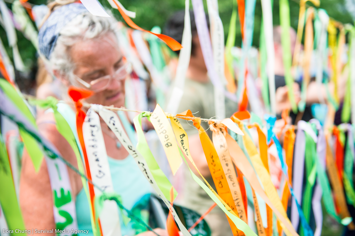 Ribbons fluttering in the wind, stories traveling the globe. Photo from the official People’s Climate March album
