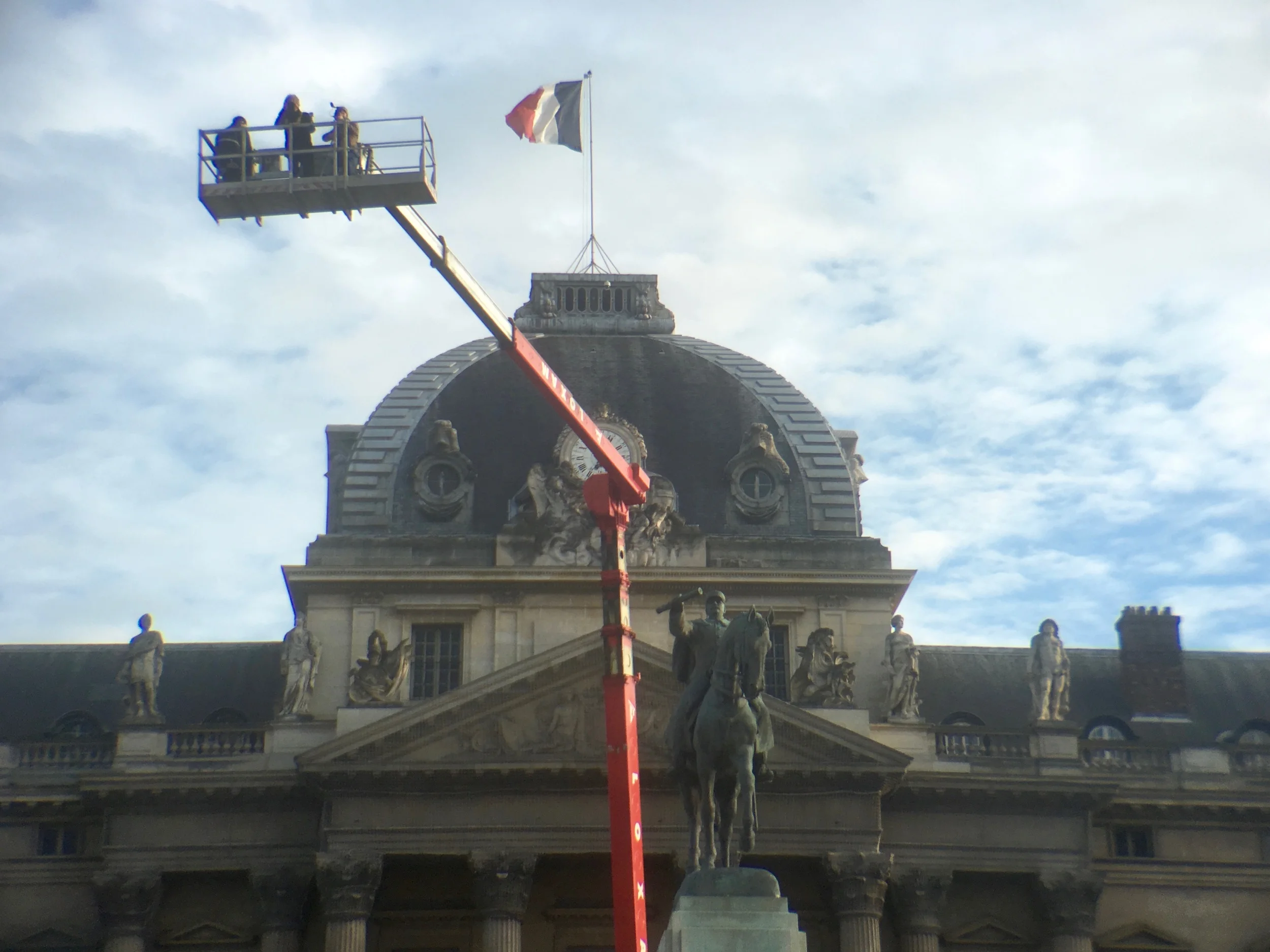 Spectral Q, aka John Q, in the lift with colleagues checking out his work. You can find his image in the New York Times, COP21 report on Dec 7, 2015.