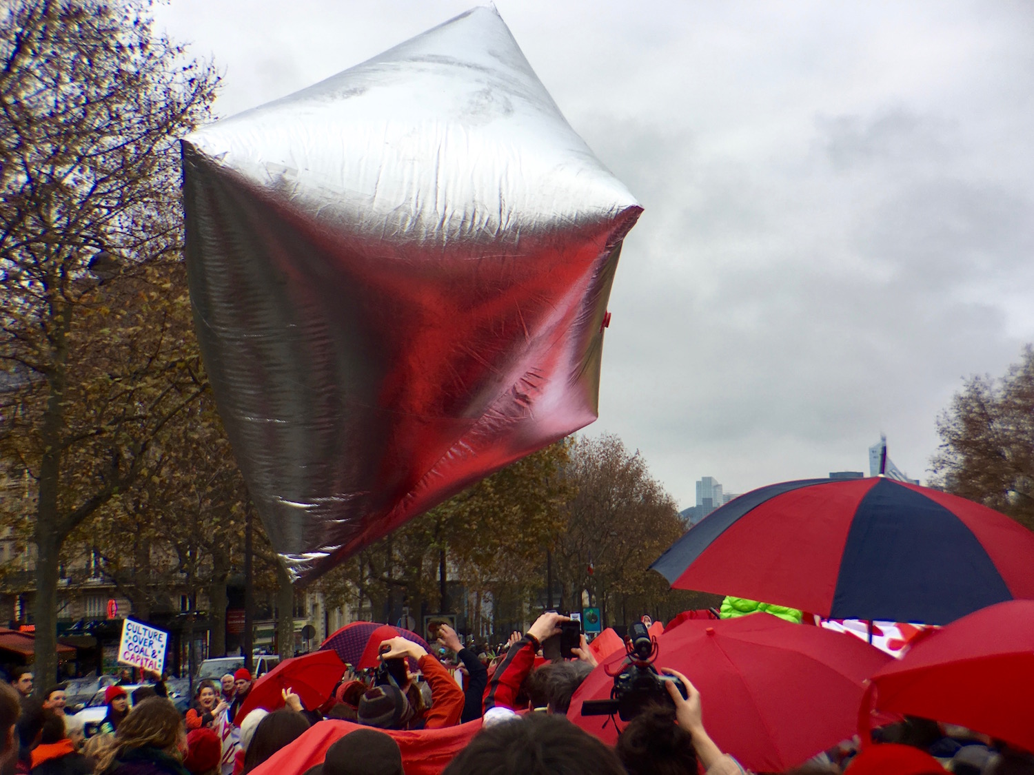 On Sunday, December 13, as the Delegates finished the final agreement, thousands of people took to the streets all over Paris in celebration and protest. This photo was taken near the Arc de Triomphe on the Avenue de la Grande Armee. 